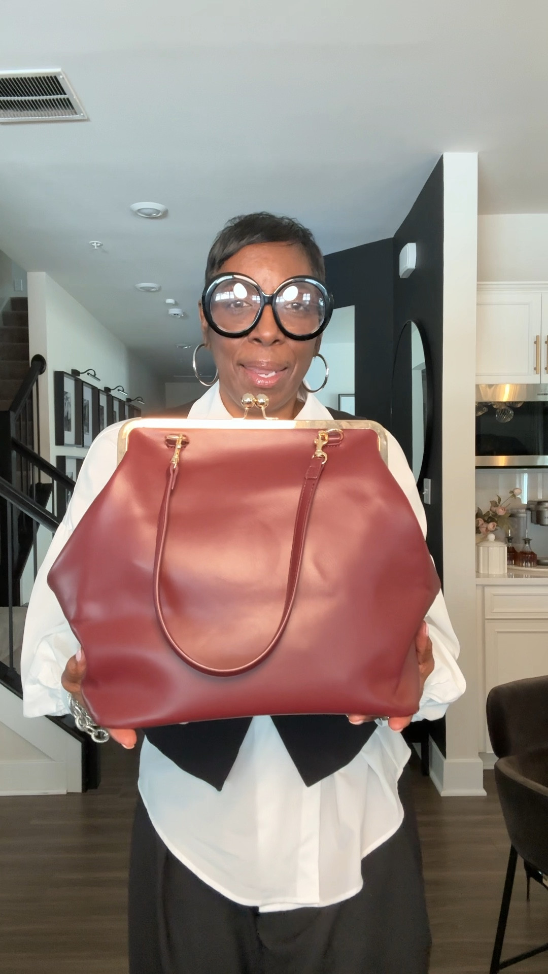 Amazon reached out and sent me their Large Kiss Lock Bag, and I chose this stunning burgundy shade — it’s even more beautiful in person.

The classic kiss-lock silhouette instantly gives that timeless, vintage feel we all love from pieces by Coach, but without the designer price point.

I was honestly impressed with the quality. The bag is beautifully structured, surprisingly roomy, and thoughtfully designed with a comfortable short strap and an interior pocket for your essentials. It’s the kind of piece that elevates a simple outfit while still being practical for everyday wear.

I always say you don’t have to spend luxury prices to get a luxury look — sometimes the best finds are the ones you discover.

If you’re interested, I’ve linked it in the comments along with my Amazon storefront and my LTK. ✨

#luxurystyle #amazonfinds #designerinspired #handbaglover #styleinspo