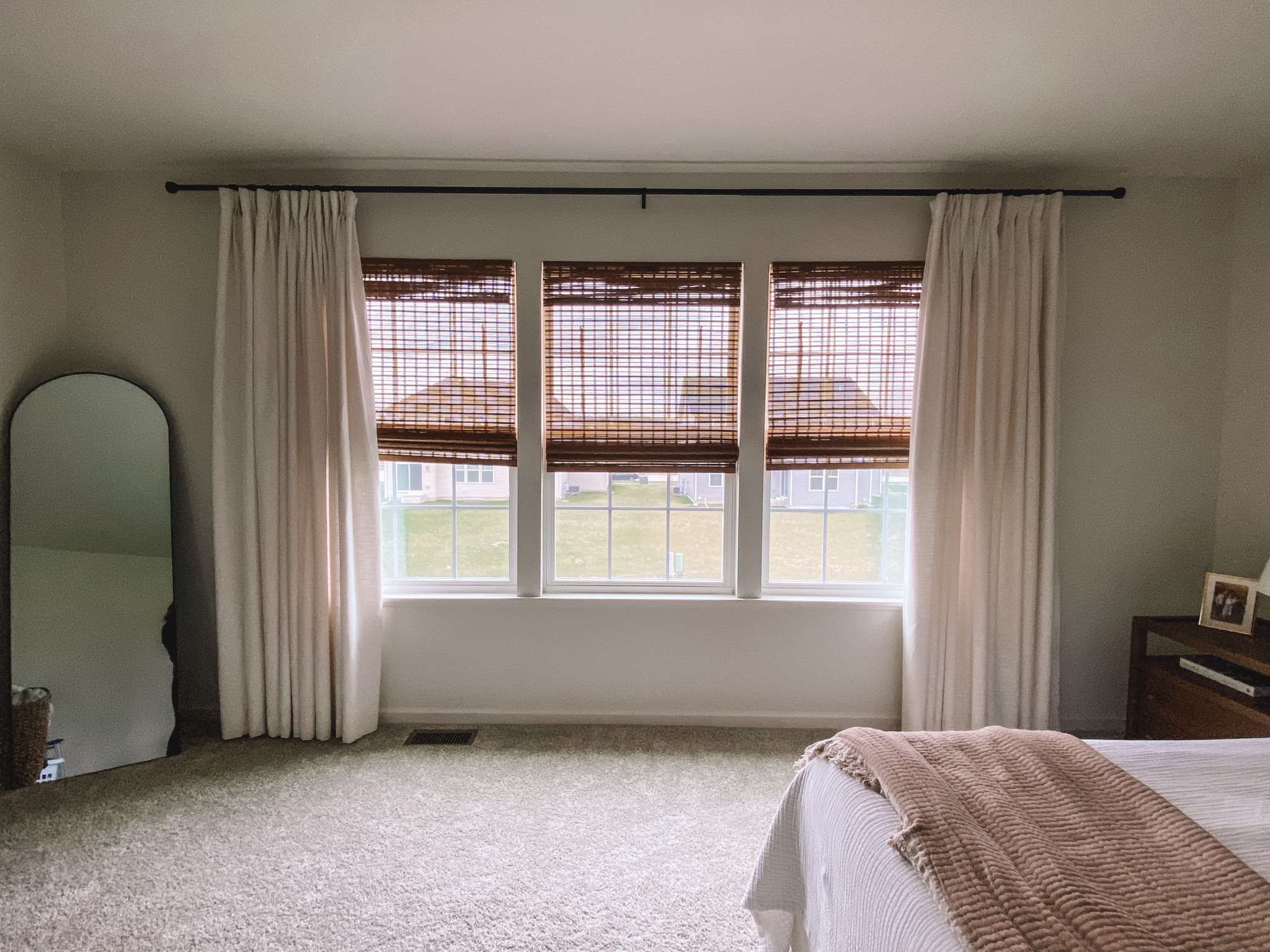 The best neutral curtains and bamboo blinds. 