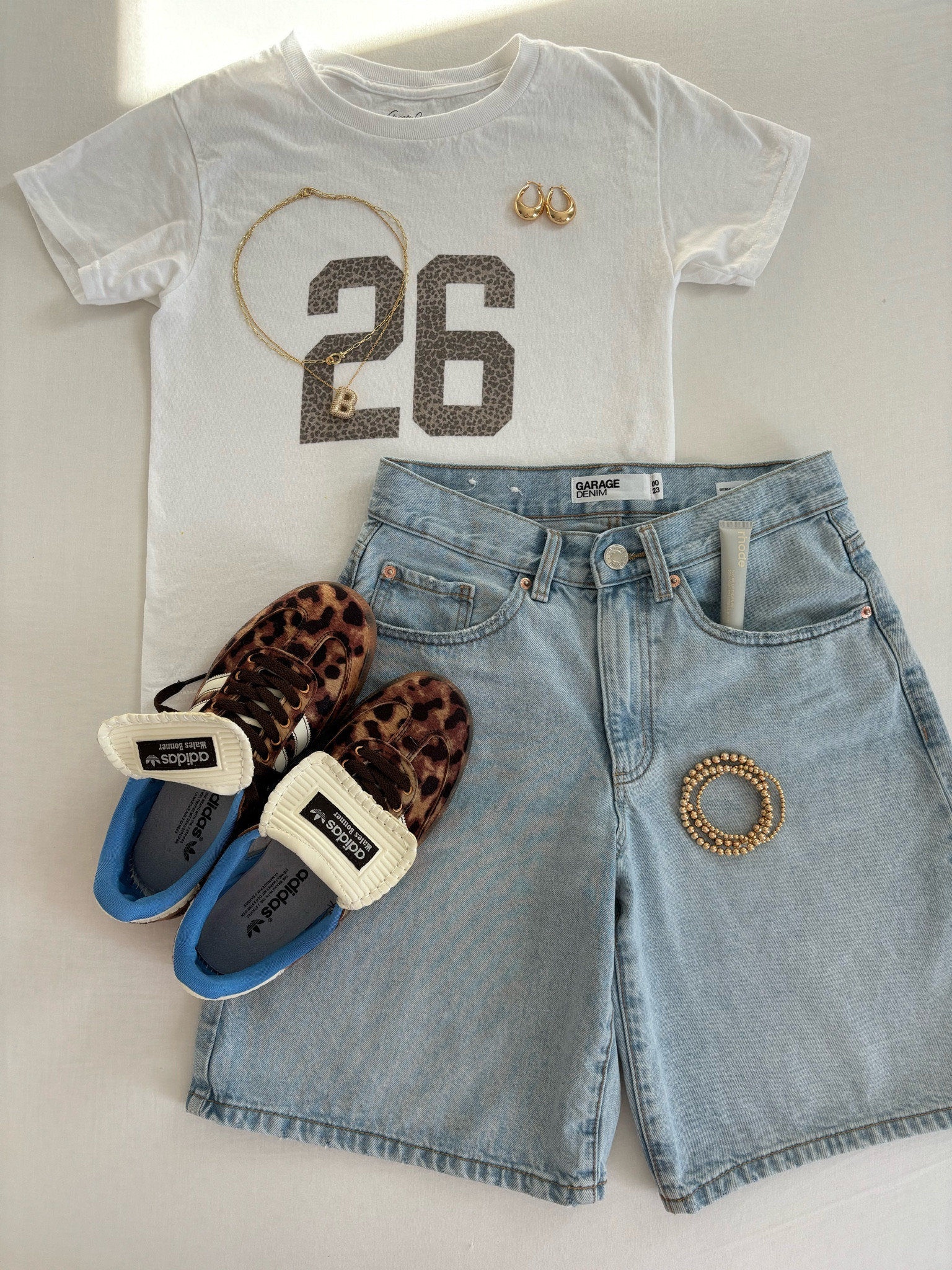 Shirt is from Gracey Jeans from TikTok and the shoes are Adidas Wales Bonner from Stock X