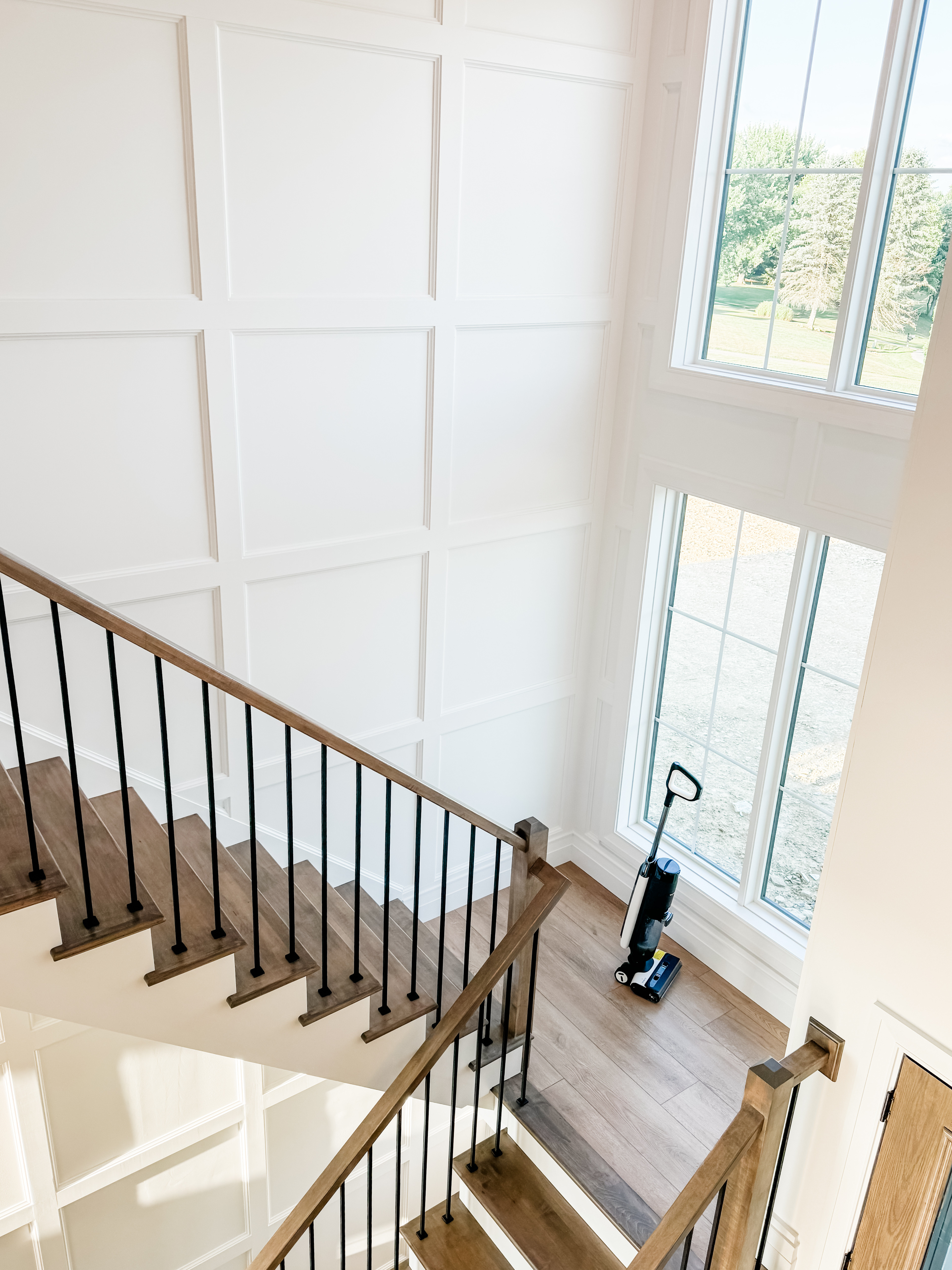 Absolutely loving how this stairwell turned out! The wall paneling adds such a statement to the space, giving it that perfect blend of modern and classic style. #HomeInspiration #StairwellDesign #ModernHome

#LTKHome #LTKFamily #LTKFindsUnder100
