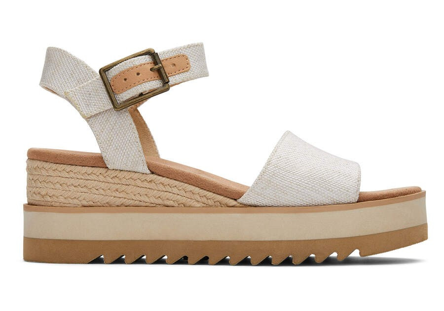 Women

Diana Natural Wedge Sandal | Toms Americas