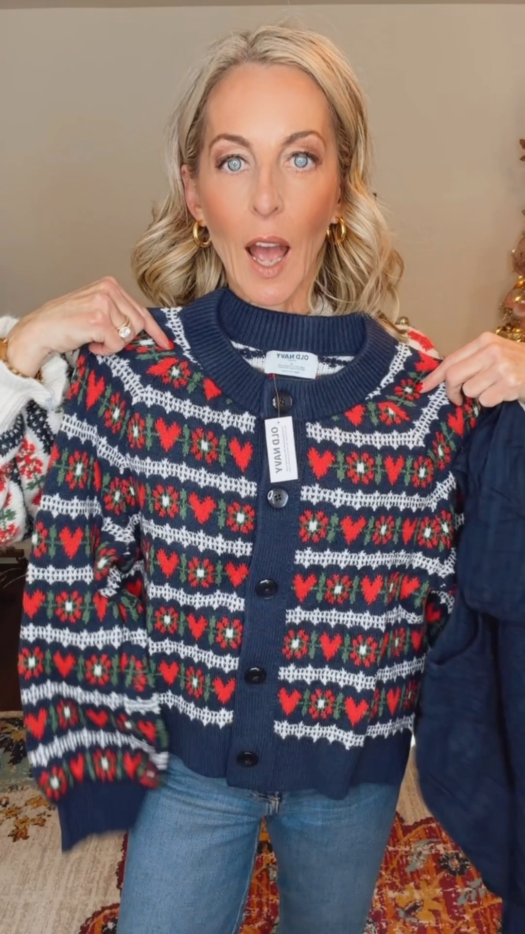 Obsessed is an understatement ❤️
This mock puff-sleeve flare mini dress is such a flattering fit—easy, feminine, and YES… it has pockets 🙌 It comes in four colors and I’m wearing a size small. Perfect on its own now and an easy transition piece later, too.

Layered with this soft crewneck printed cardigan with the sweetest Valentine hearts and floral details—such a cozy, charming combo that instantly elevates the look. Also wearing a size small here.