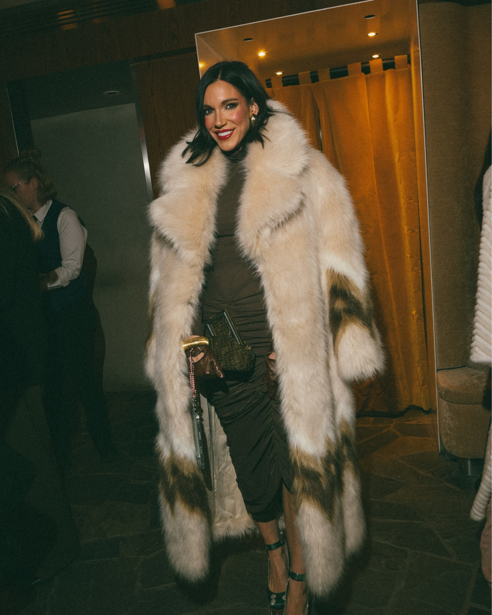 Wore this statement coat out in Aspen to a dinner sponsored by FWRD and Fendi.  Still pinching myself about this! 

I paired my 70’s feeling statement coat over this body hugging brown long-sleeved dress!! It has rushing in all the right places, and is under $270! This date-night worthy dress is amazing! 

Wore it with platform louboutins that are a few years old, detailed brown leather gloves and a Fendi clutch. 

#LTKootd #LTKTravel #LTKdayinmylife