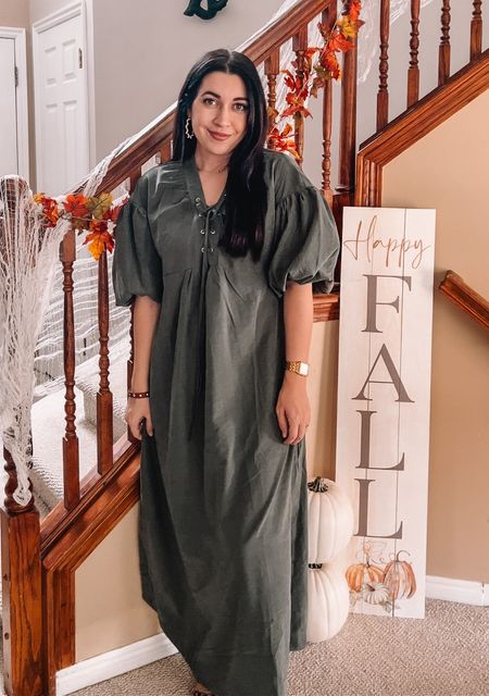 Adorable flowy and puffy sleeve dress!! Olive color with suede like texture. Wearing size small. I’m 5’2 and hits at my ankles. Fun drawstring detail that you can tie in a bow! 

#LTKfindsunder100 #LTKSeasonal #LTKHoliday