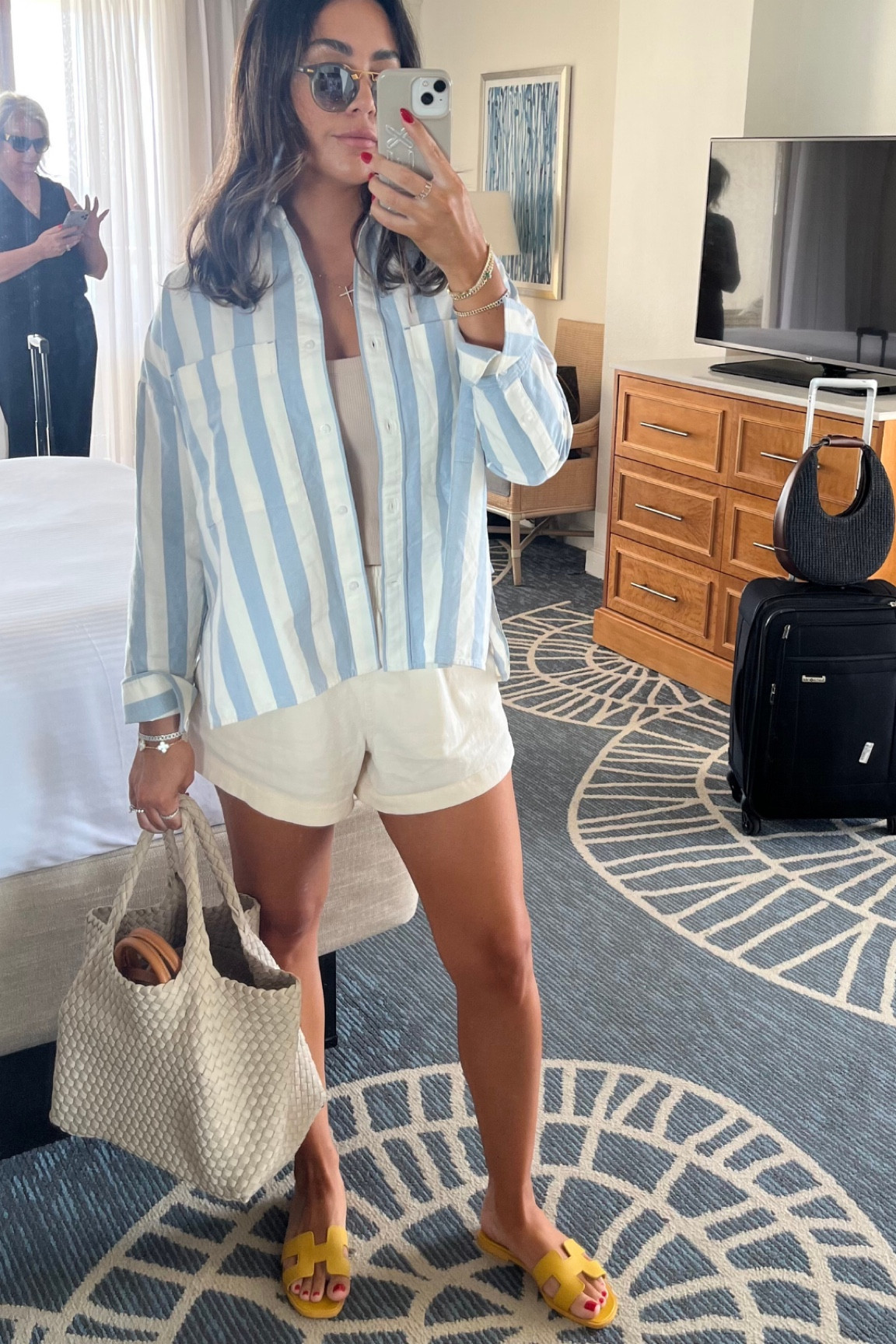 My naghedi bag is one of my favorite totes right now! It is the perfect bag for everyday, beach trips, work, etc! This bag is around $300 but I linked a similar one for $70!

Tote, purse, bag, everyday style, Alex Garza, Florida style, Amazon 