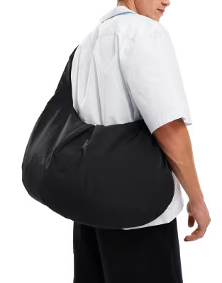 ASOS DESIGN nylon slouchy sling bag in black | ASOS (Global)