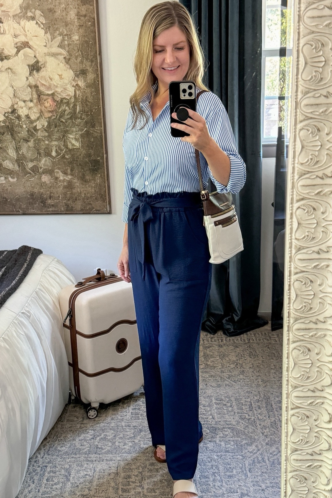 ✨ CARRY-ON ONLY TRAVEL CAPSULE IDEAS
Everything I’m packing for a 12 day summer trip to Europe with 15 clothing pieces from Walmart! 

I tried on 12 outfits here, but you can make MANY more outfits than this using these pieces! 

We’re traveling to Stockholm to finally see some of my family after many years of waiting. And we’re visiting London and Paris for a few days between as ✈️ layovers while we’re there. 

Packing List Below 👇 

Tops:
White button-down
Blue stripe button-down
Black stripe pullover 
White henley 
White tube top 

Bottoms:
Dark wash jeans
Khaki linen look pants 
Navy wide leg pants 
Light blue wide leg pants 
Olive maxi skirt 

Layers:
Denim jacket
White blazer 
Trench raincoat 

Shoes:
White leather sneakers 
Brown sandals 
Canvas flats 

Accessories:
Crossbody bag
Sun hat 

(I’m tossing in 2 tees & 2 leggings for pjs and of course undies as well.)

TIP: tightly roll each clothing piece and use compression bags to maximize suitcase space. 

All of this fits in my carry-on sized suitcase with toiletries in my personal item tote to fit under the seat. 

#walmartfashion #travelcapsule #capsulewardrobe #carryononly #packinglight #europetravel #minimalistpacking #packwithme #carryonluggage #packinglist #travelessentials 

#LTKeurope #LTKtravel