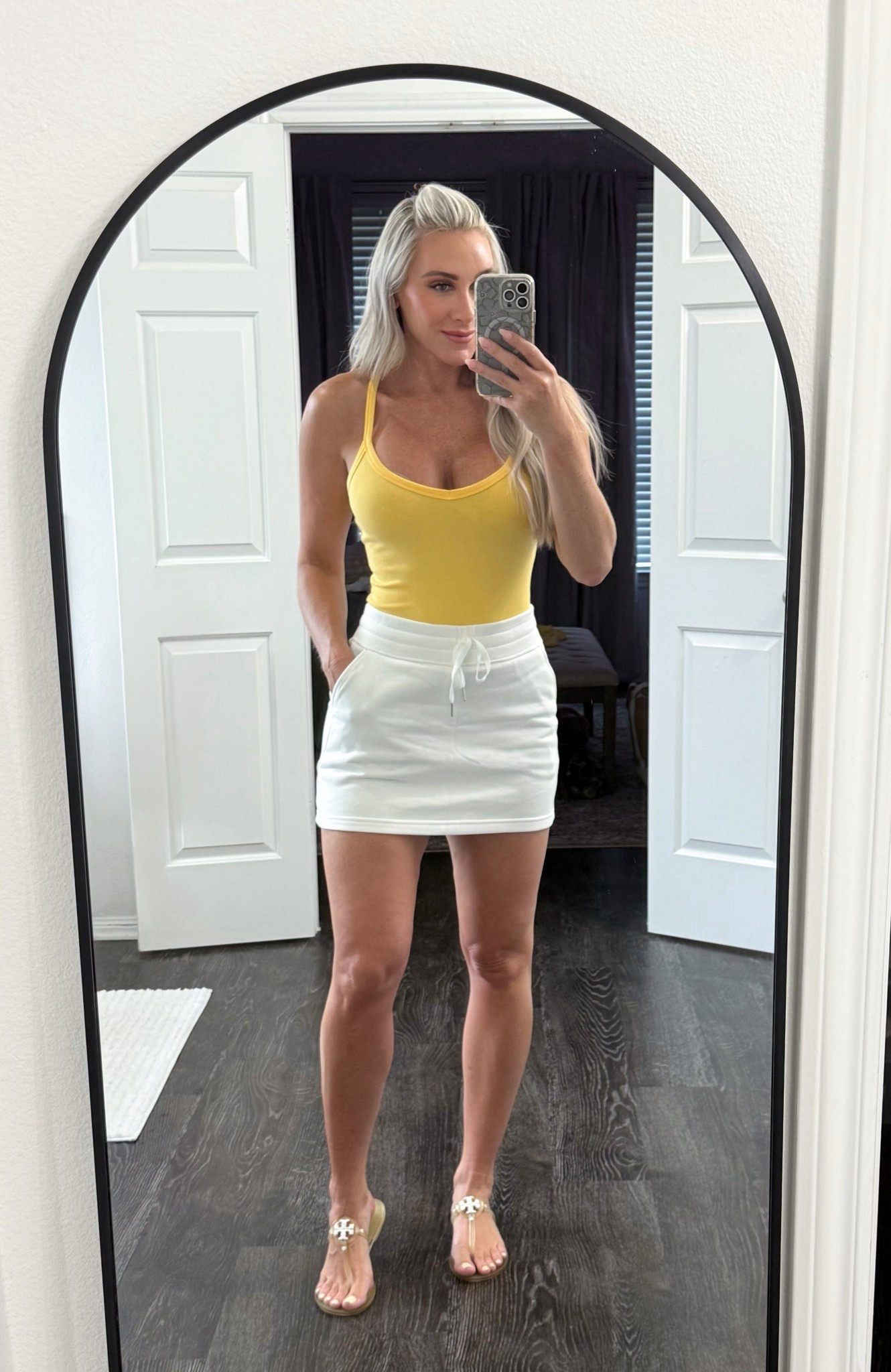 This skirt with built in shorts is my new favorite and I’ll be ordering in every color! It’s such a good quality and the built in shorts are so soft! 

Fits TTS - I’m wearing a small in skirt & top. Tory Burch flip flops I size up half a size.  

#LTKShoeCrush #LTKActive #LTKStyleTip