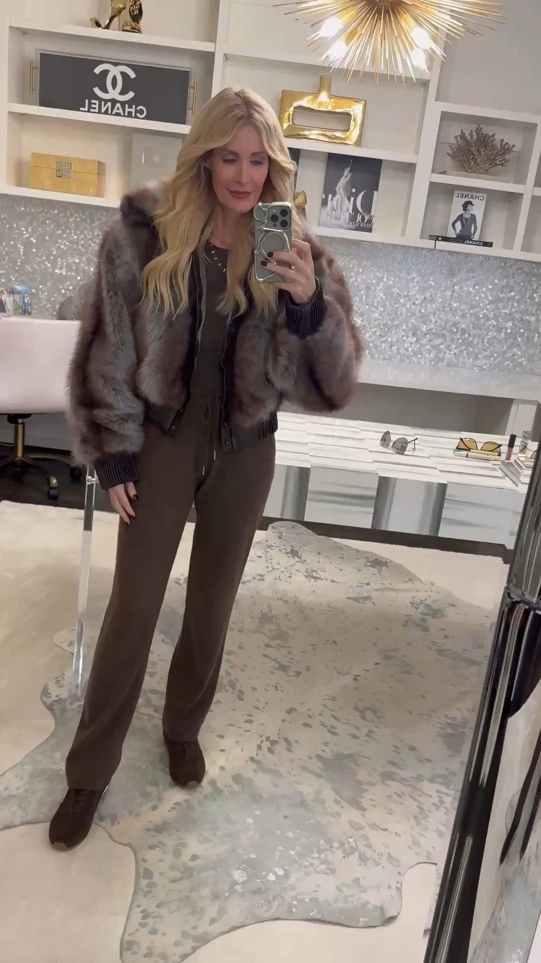 Casual, cozy, and still chic 🤎 I’m wearing the Quince cashmere lounge pants with the matching cashmere sweater—such an elevated everyday set at an amazing price point. I layered it with my A-Firm faux fur jacket, and the blue with chocolate brown color combo feels especially fresh and luxe for casual winter days. I’m wearing an XS in the cashmere pants, top, and jacket, and everything fits true to size.  

 

#LTKOver40 #LTKFindsUnder100 #LTKTravel