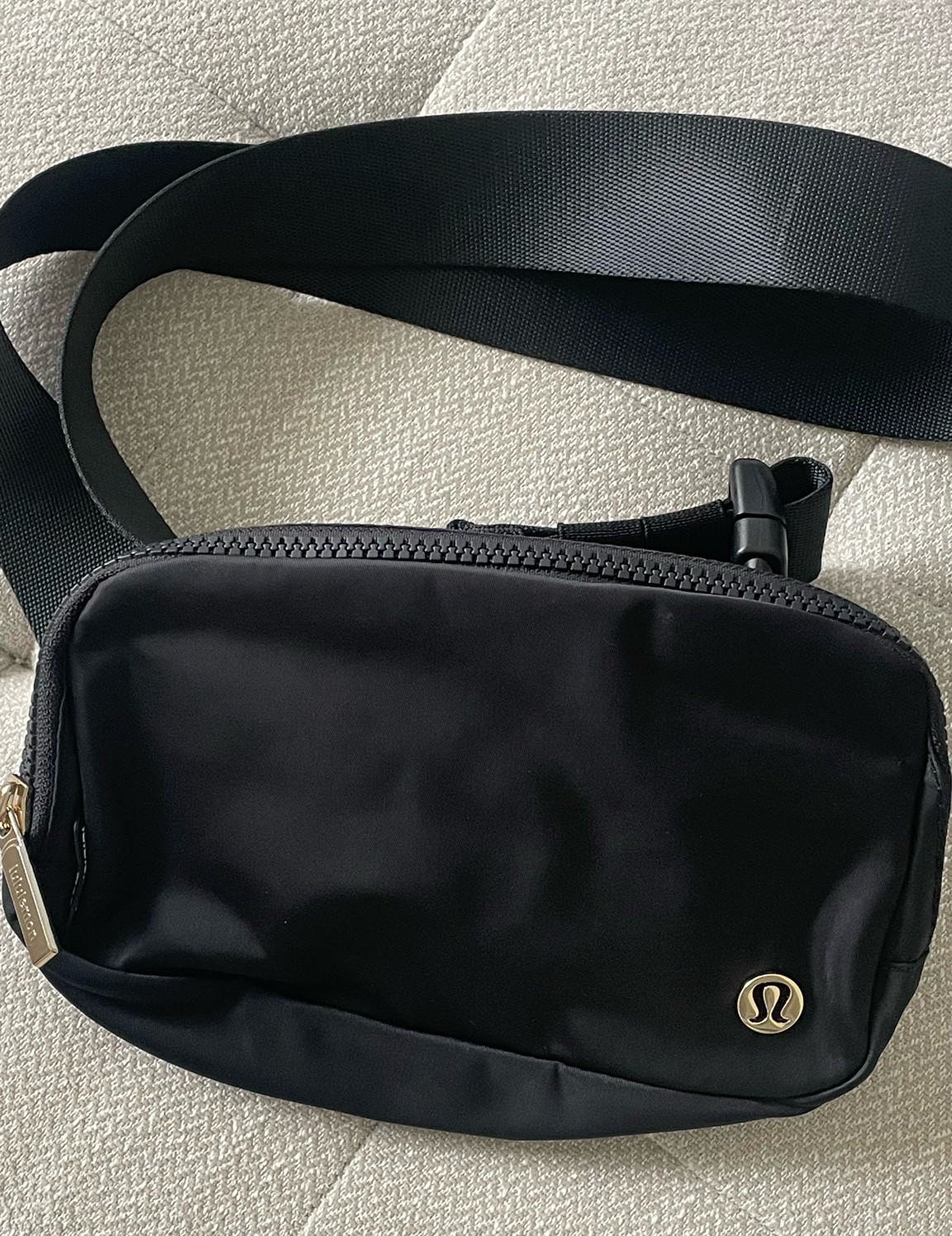 black + gold lululemon everywhere belt bag 1L 

#lululemon #beltbag

#LTKunder50 #LTKtravel #LTKitbag