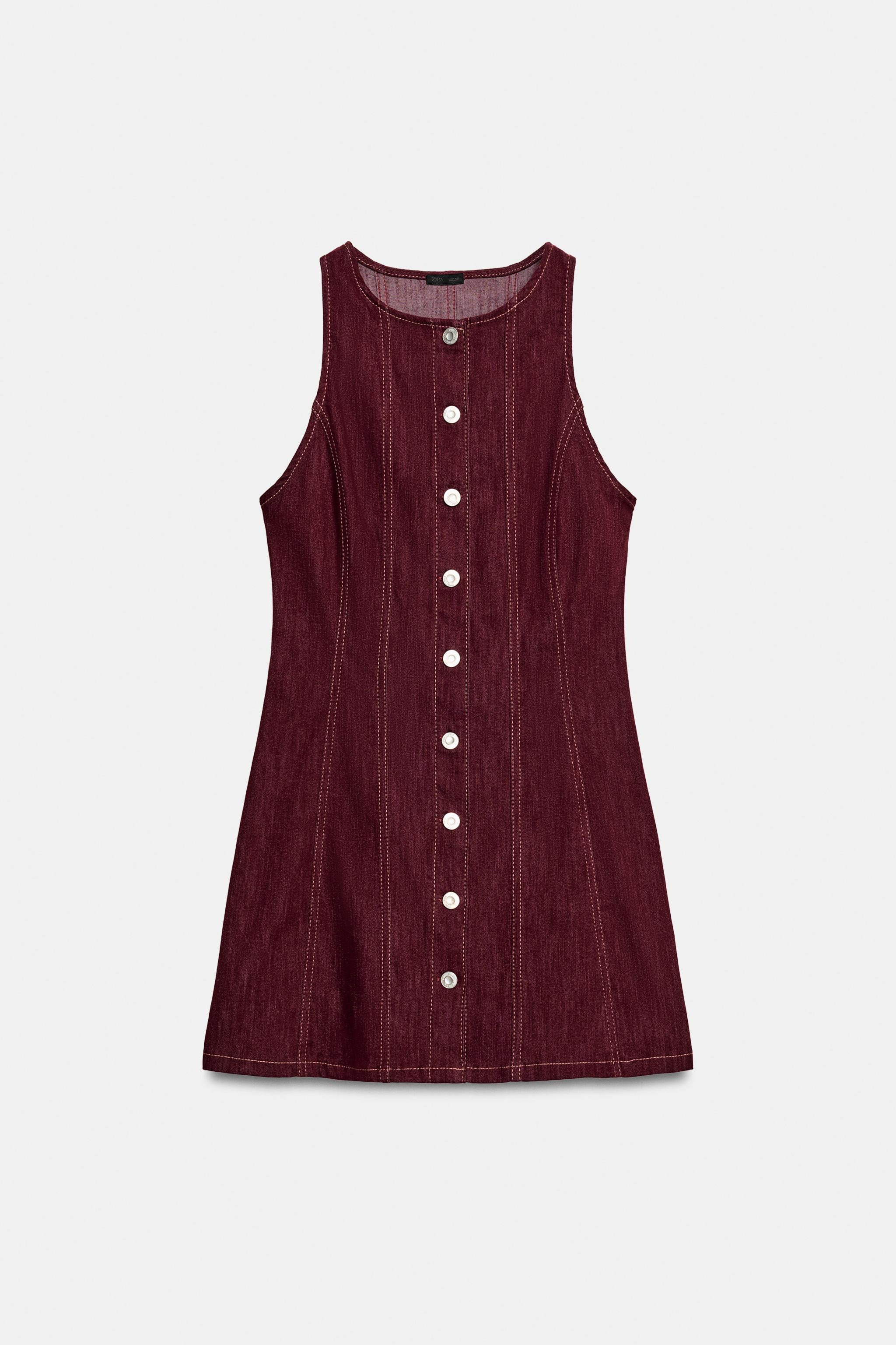 Short dress with a round neck and sleeveless design. Features metal button front fastening and co... | Zara UK
