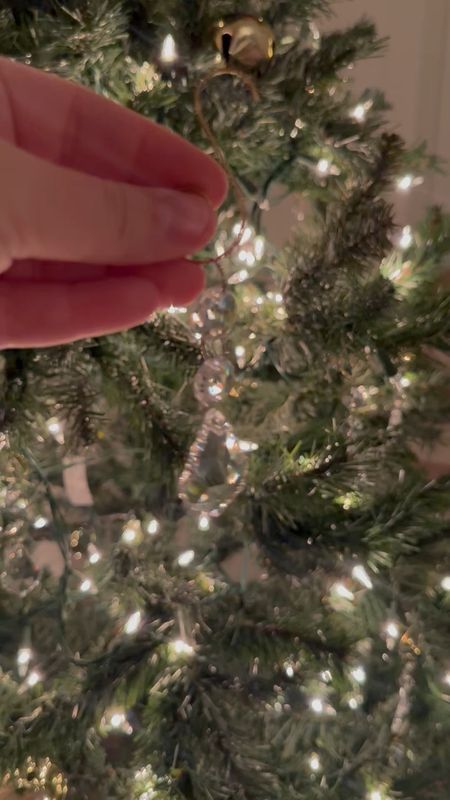 Here’s an idea! Try swapping your icicles and tensile for chandelier crystals! They are so sparkly and catch all of the light on your Christmas tree! Don’t forget to use a pretty ornament hook! 

#LTKSeasonal #LTKHoliday