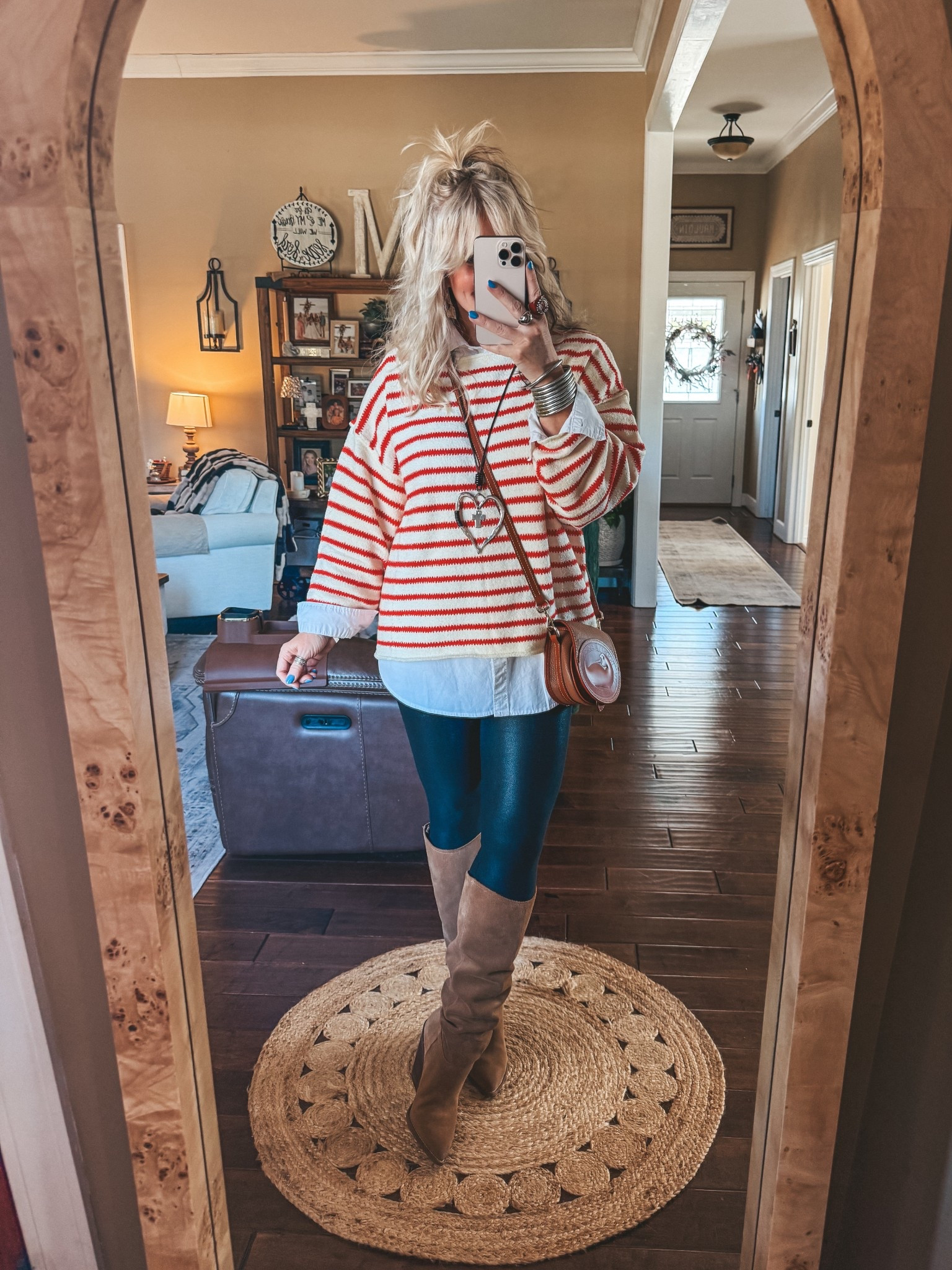 Love this striped sweater and perfect over a button up! These faux leather leggings are amazing too! 

#LTKootd #LTKValentine #LTKOver40