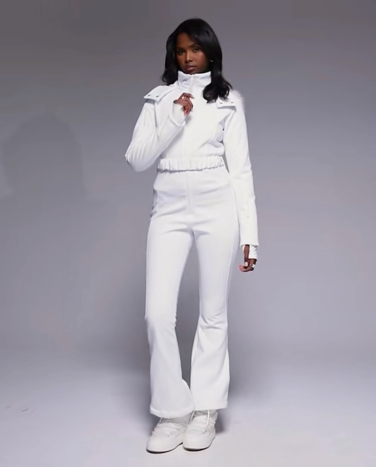  Ski soft shell belted ski suit with slim kick leg and faux fur hood in white

#LTKActive #LTKTravel #LTKgrwm