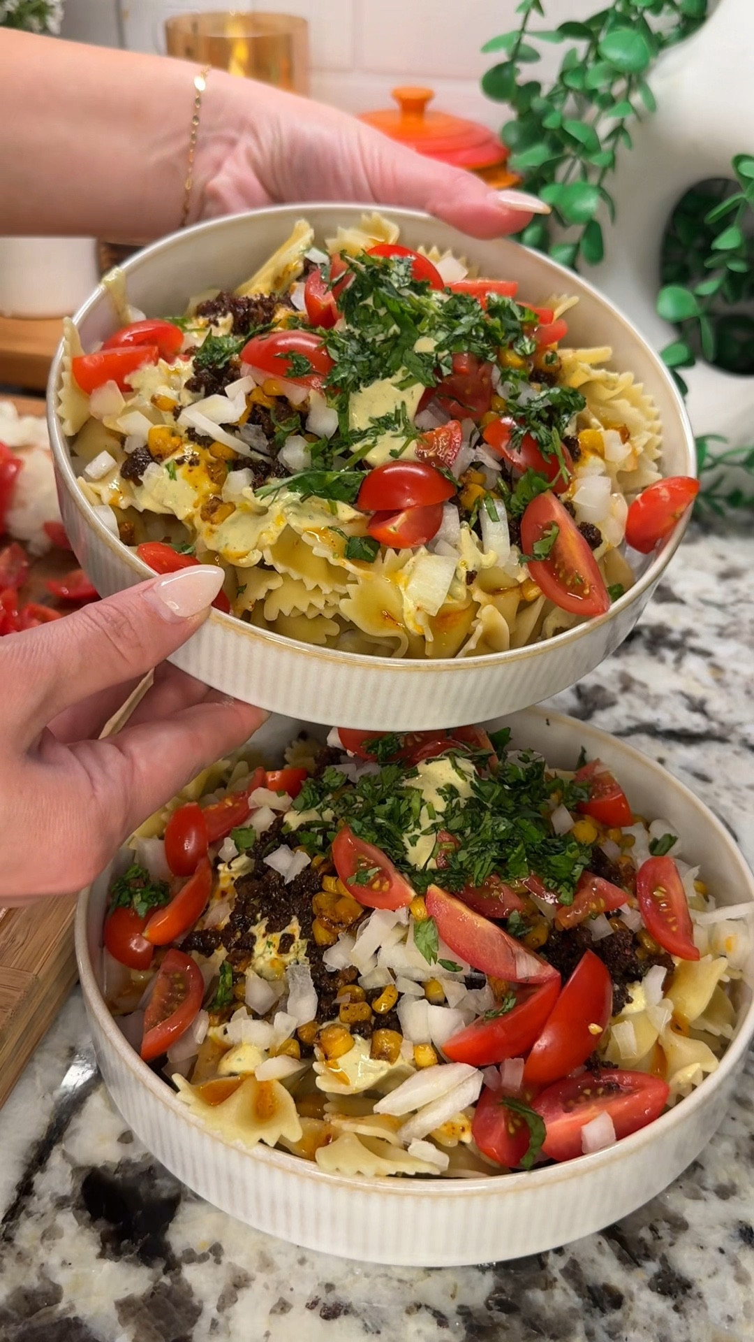 giving the viral turkish pasta a ✨taco twist✨ & its delicious! with crispy taco beef, creamy cilantro taco sauce & toasted chili corn- it was a hit in our house!

love how adaptive this dish is for an easy weeknight meal🌮🍅🌿

Ingredients:
- 1 lb ground beef & 1 packet taco seasoning
- 1 can sweet corn (drained & rinsed), season with salt, pepper, chili powder
- 1 box bow tie pasta
- cherry tomatoes, quartered
- 1/2 yellow onion, diced
- chopped fresh cilantro
- 1/2 stick butter, melted & 1/2 package taco seasoning

yogurt sauce
- 10 oz nonfat plain Greek yogurt
- handful cilantro
- juice of 1 large lime (about 1/4 cup)
- 1 tbsp sour cream
- 1 tsp salt
- 1 tsp chili powder
- 1/2 package taco seasoning

#LTKHome #LTKSeasonal #LTKFamily