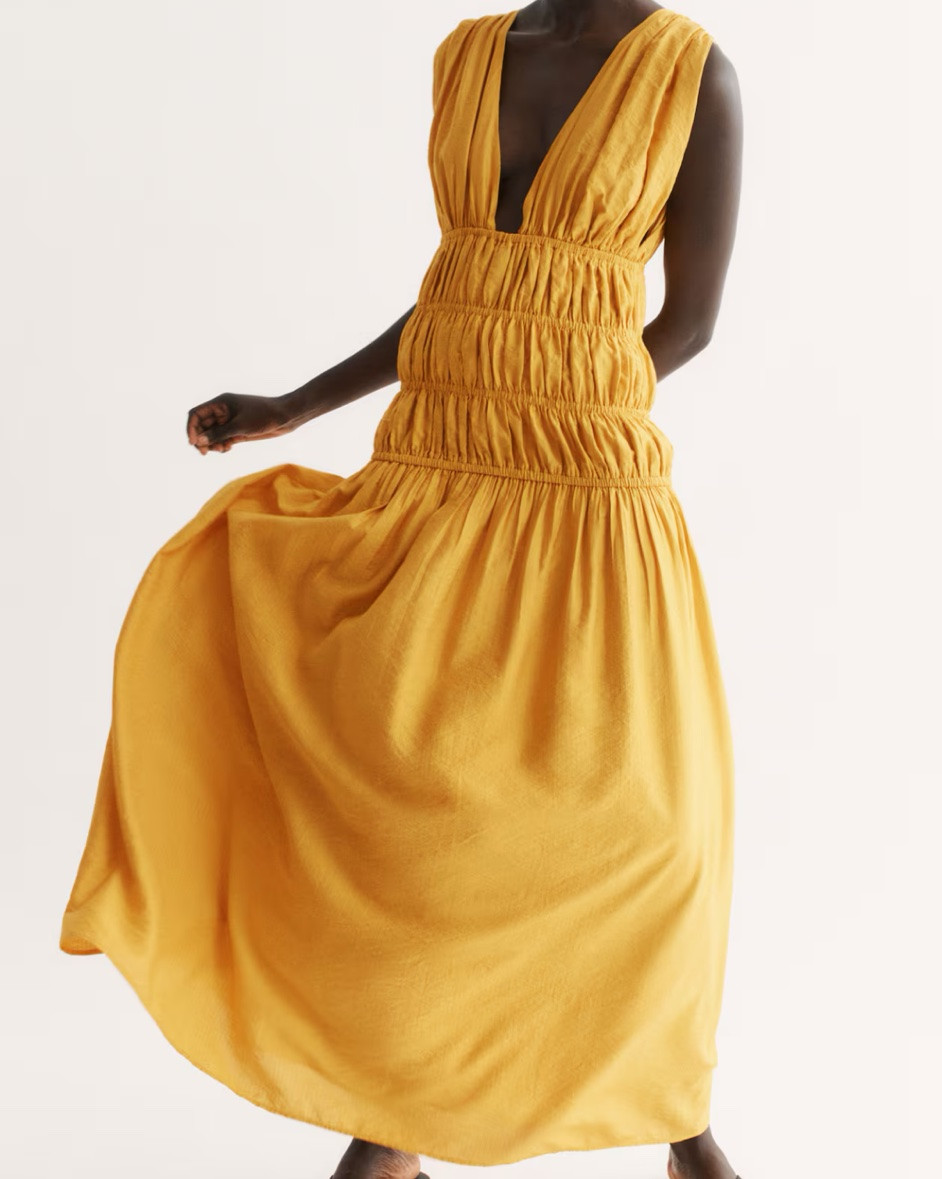 Gold smocked midi dress - wedding guest dress

#LTKSeasonal