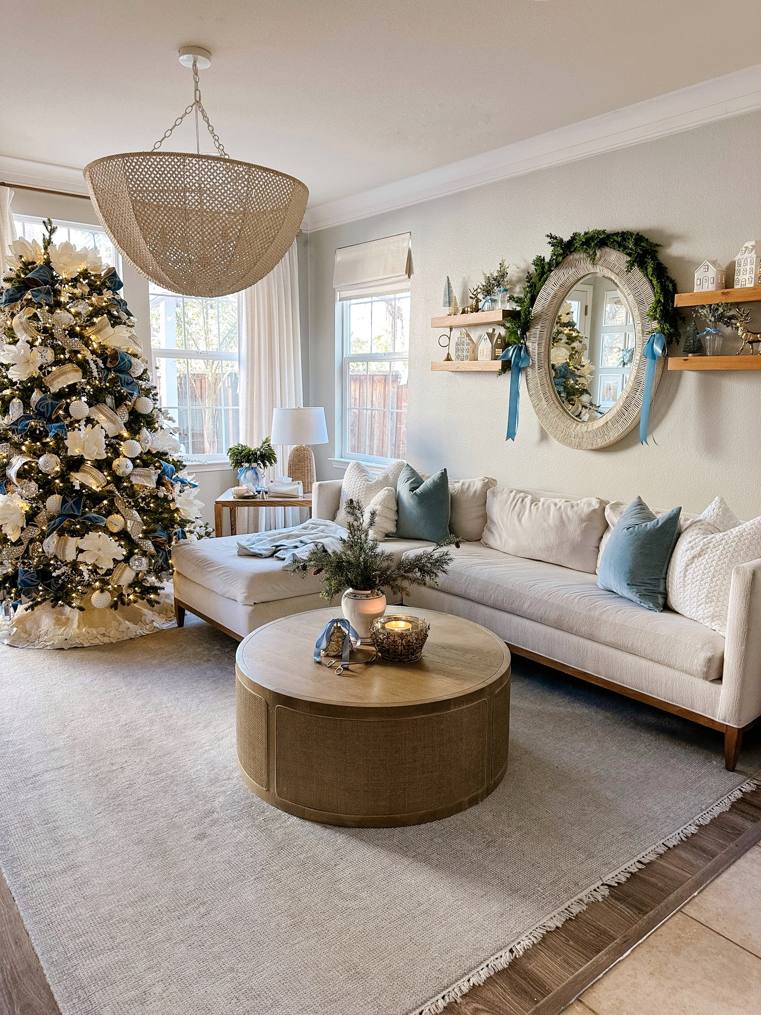 I don’t get sick of this view every year at Christmas. This year I decided to decorate the mirror in here and live how it looks with the garland. This tree is by far my favorite tree it has 8 settings between the white and colored lights. All of my trees are currently on sale and linked. Comment ‘TREE' for links sent to your DMs. 

#LTKSeasonal #LTKHome #LTKHoliday