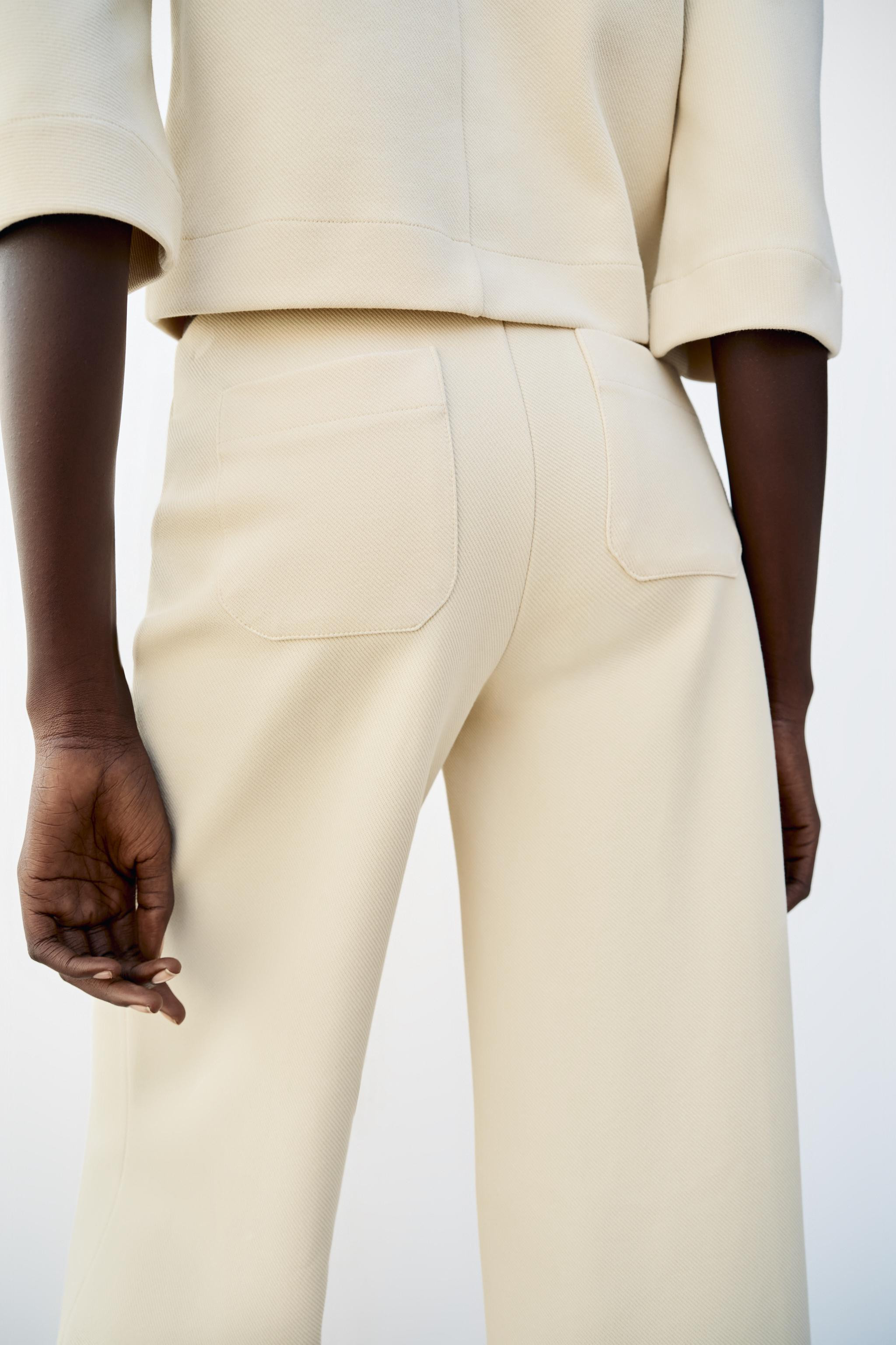 Model height: 178 cmTrousers made of a cotton blend. Mid-waist with an elastic waistband. Wide-le... | Zara UK