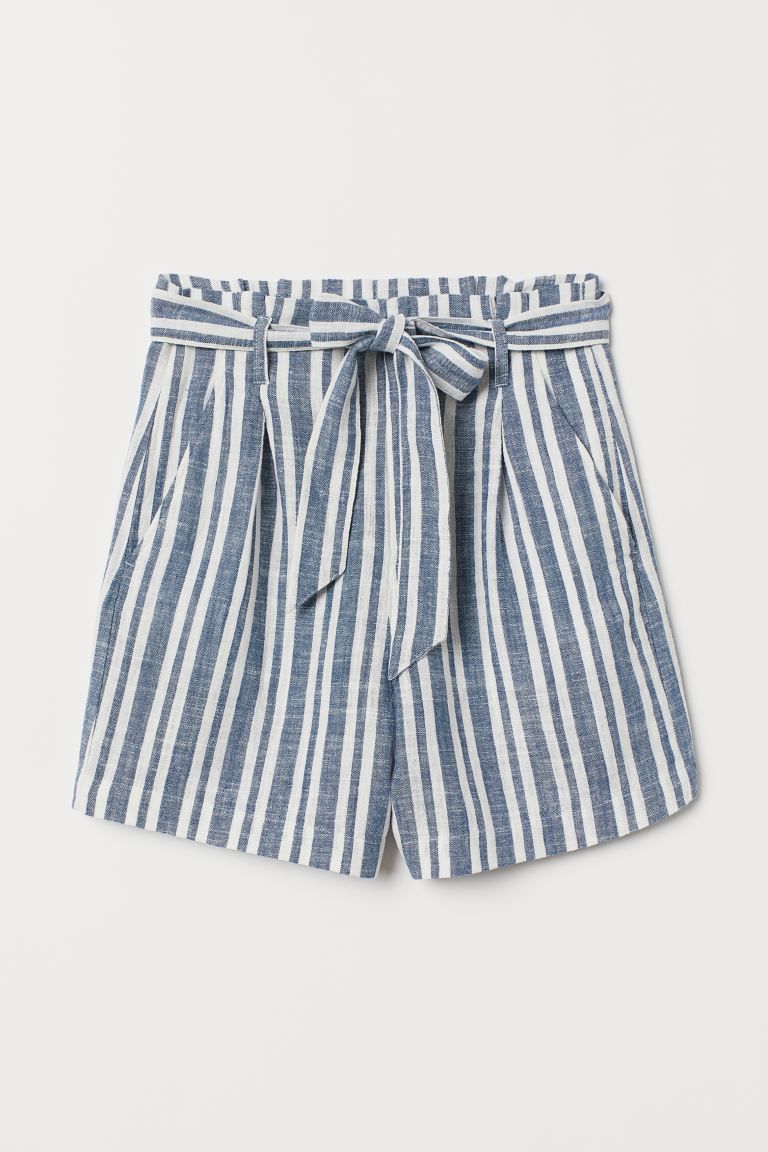 Shorts in woven fabric. Paper-bag waist, pleats at front, zip fly, and tie belt. Side pockets and... | H&M (US + CA)