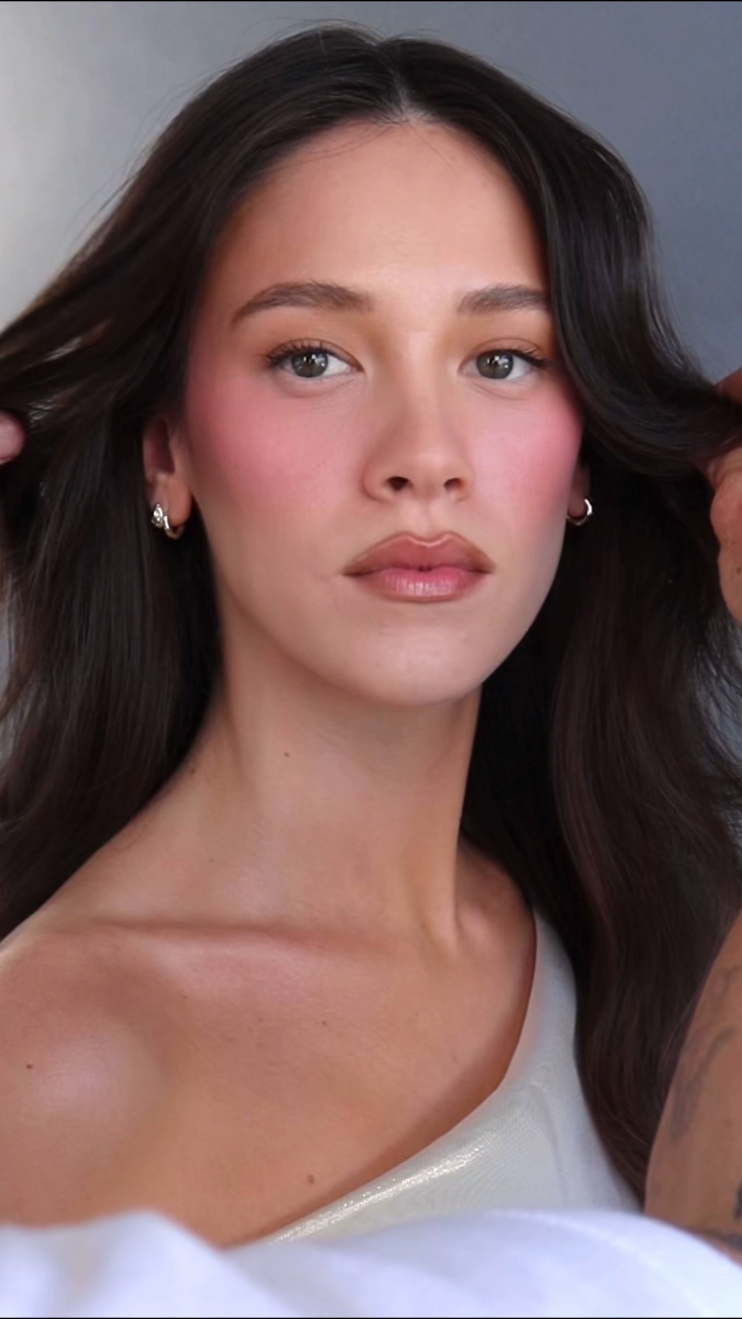 Hey my love,

See below for the product breakdown and shoppable links:
	1.	Paula’s Choice Exfoliating Pads
	2.	Ole Henriksen Peach Glaze Glow Mist
	3.	ESMI Probiotic Skin Mylck
	4.	Byoma Barrier Eye Cream
	5.	Fenty Plush Puddin Lip Mask
	6.	NYX Professional Makeup Micro Brow Pencil in Ash Blonde (0.5g)
	7.	Anastasia Beverly Hills Brow Freeze Gel
	8.	Anastasia Beverly Hills Impeccable Blurring Second Skin Foundation
	9.	Anastasia Beverly Hills Smooth Blur Contour in Shadow
	10.	YSL Beauty Make Me Blush in 66
	11.	YSL Beauty All Hours Concealer
	12.	Givenchy Prisme Libre Loose Powder in Rose
	13.	YSL Beauty Make Me Blush Powder in 42
	14.	YSL Beauty All Hours Hyper Bronzer in #3
	15.	Victoria Beckham Contour Stick in #3
	16.	Clarins Water Lip Stain in Rose Water
	17.	Charlotte Tilbury Duo Lip Liner in Tan
	18.	Make Up For Ever Super Boost Lip Gloss in Crystal
	19.	Make Up For Ever HD Pressed Powder in 4H01 (used as eyeshadow)
	20.	YSL Beauty Lash Clash Mascara in Black

Let me know if you have any questions or need help choosing shades.
X MM
