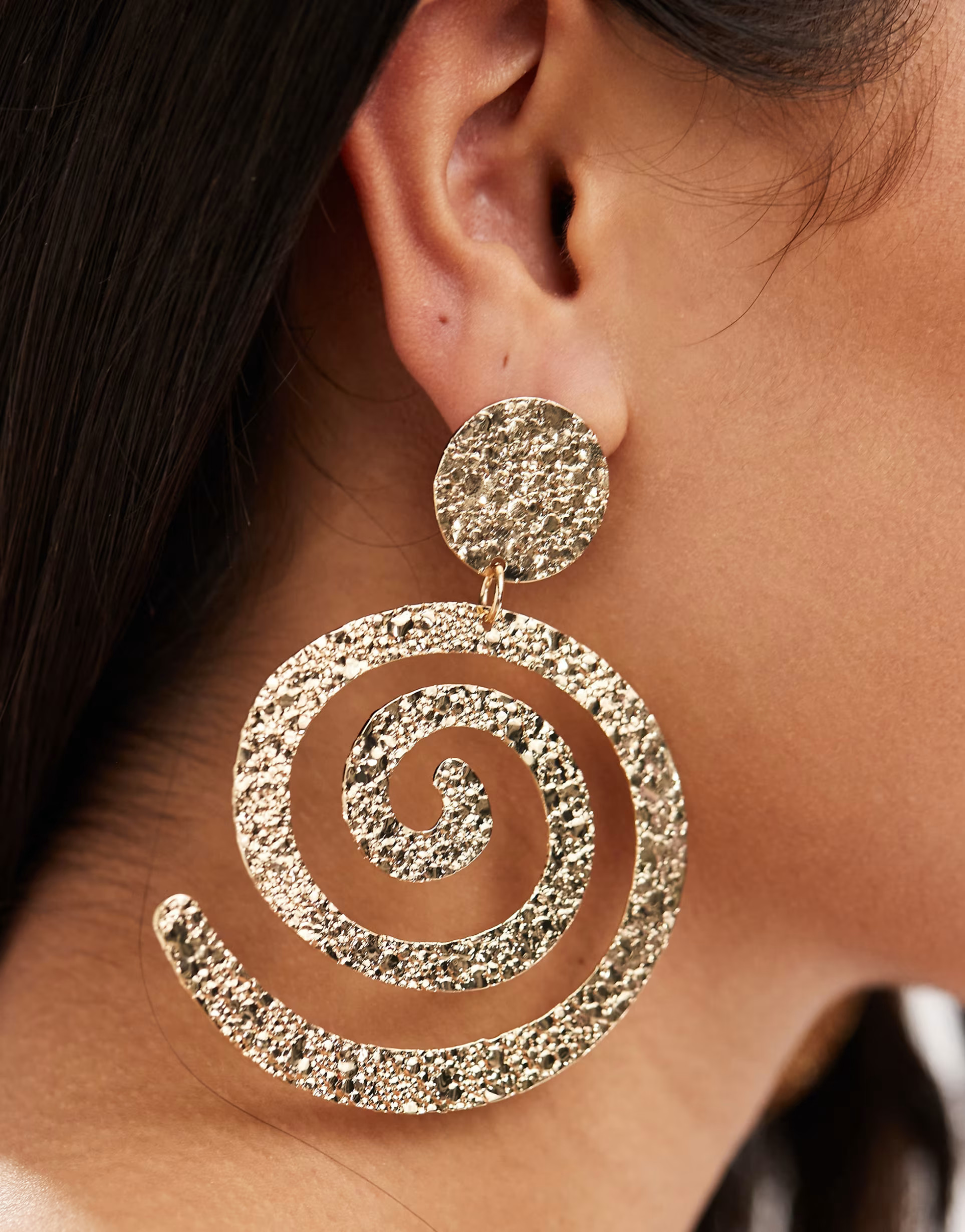 ASOS DESIGN drop earrings with hammered swirl design in gold tone | ASOS | ASOS (Global)