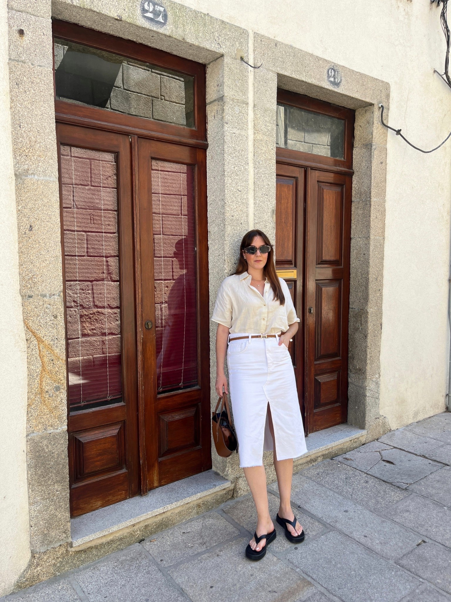Casual stroll in the streets of the oldest town in Portugal 🤎 #MangoGirls 

outfit details:
-linen shirt from @mango 
-midi skirt from @mango 
-sandals platform from @mango 
-tote bag from @zara 
-belt from @hermes 

.
.
.

washable, linen top, casual, comfort, style, flattering silhouette, effortless, low-maintenance, chic statement. 

#portugal #vacation #europe #summer #eurosummer #europestyle_ #effortlesschic #versatile #minimalist #fashion #elegant #casual #chic #effortless 

#LTKStyleTip #LTKSeasonal #LTKFindsUnder100