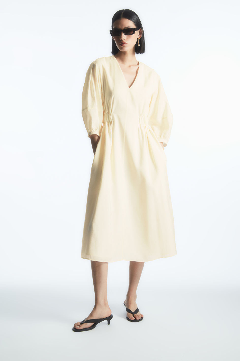 VOLUMINOUS V-NECK DRESS - IVORY - COS | COS (EU)
