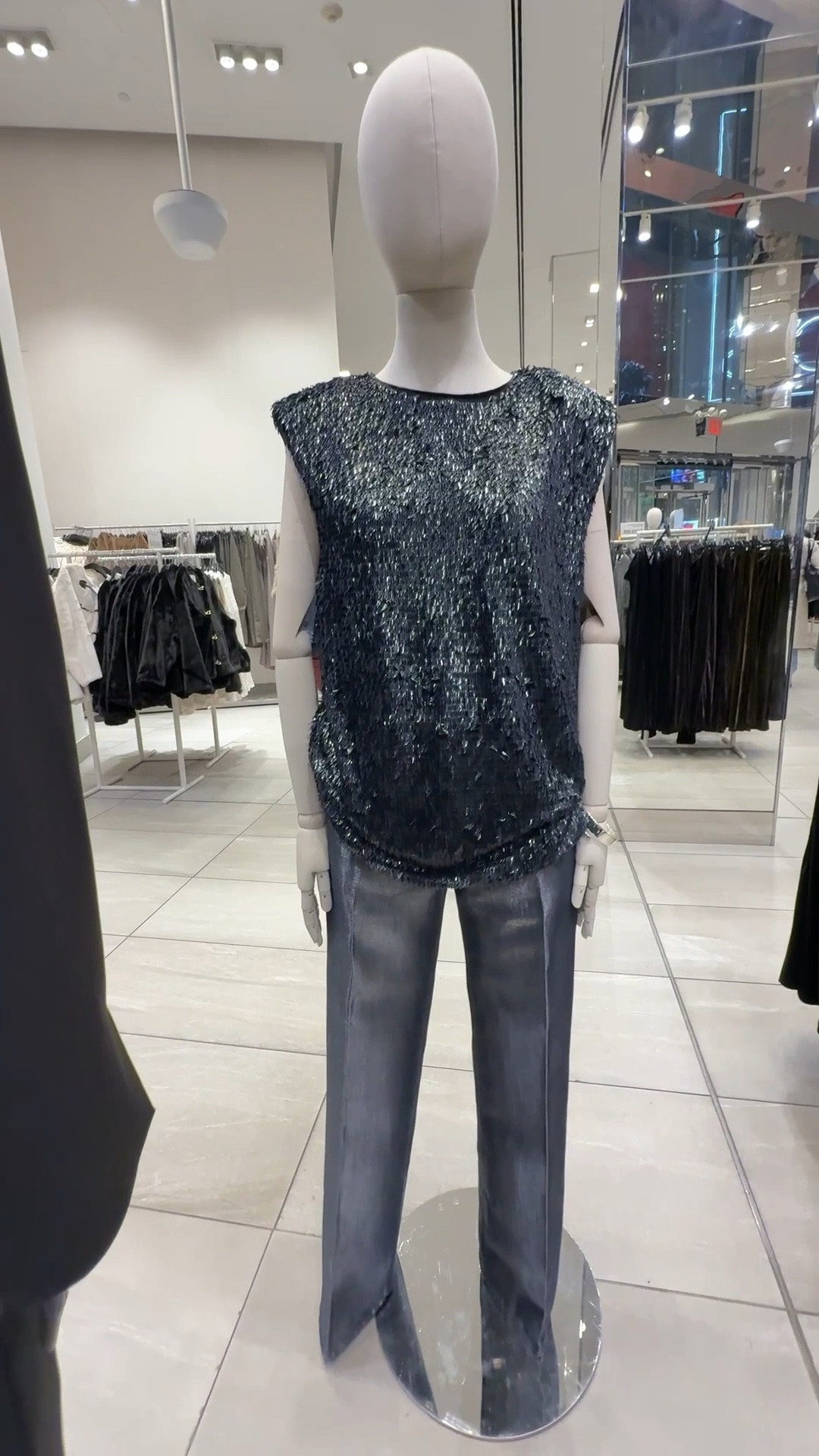 Tell me why this feels like Studio 54 met street style.
This sequin shoulder-pad top and shimmer jean combo is that perfect balance — disco energy with downtown ease. You can dress it up for a night out or tone it down with sneakers and still look intentional.

Style tip: Mix textures to keep the look modern — matte accessories or a structured bag ground the shine while letting the sparkle stay center stage.

#LTKFindsUnder50 #LTKHoliday #LTKFindsUnder100