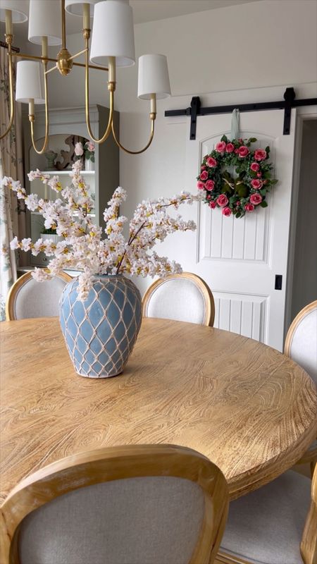 The viral cherry blossom stems look so good! I love how affordable they are for a spring decor look in my dining room. I have 2 bunches in my large vase pot  

Grandmillenial, blossoms, stems, faux floral, round dining table, spring wreath

#LTKhome