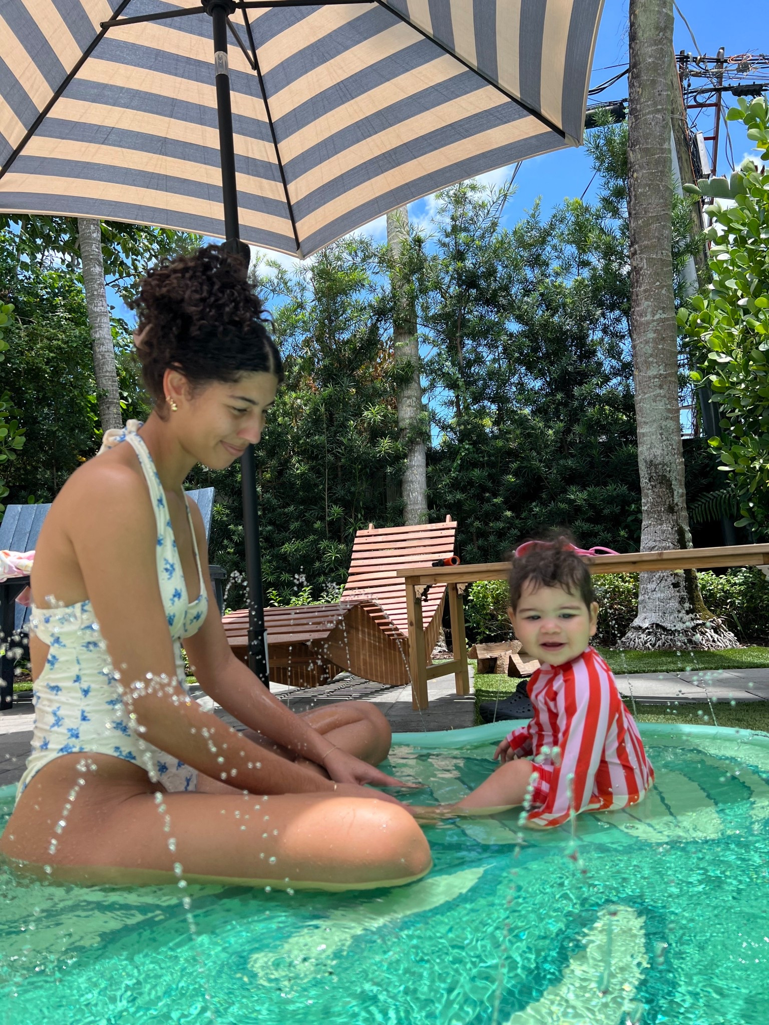 Butter yellow eyelet floral one piece swimsuit - princess Polly 

Baby swimsuit - Hanna Anderson 

Splash pad/ baby pool - minnidip