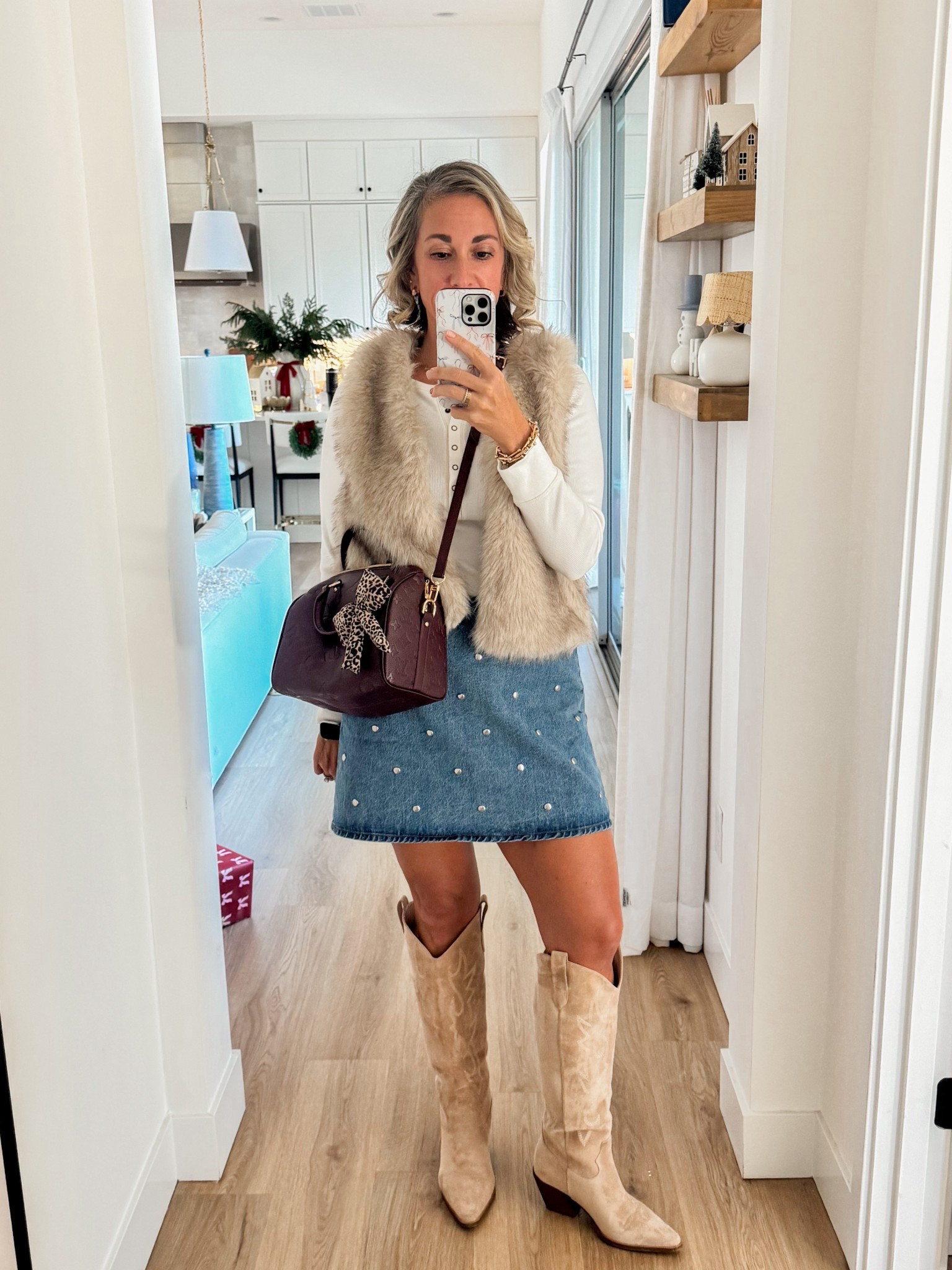 Loving this faux fur vest from H&M and these cowboy boots are a fave! 

#LTKOver40 #LTKootd #LTKSeasonal