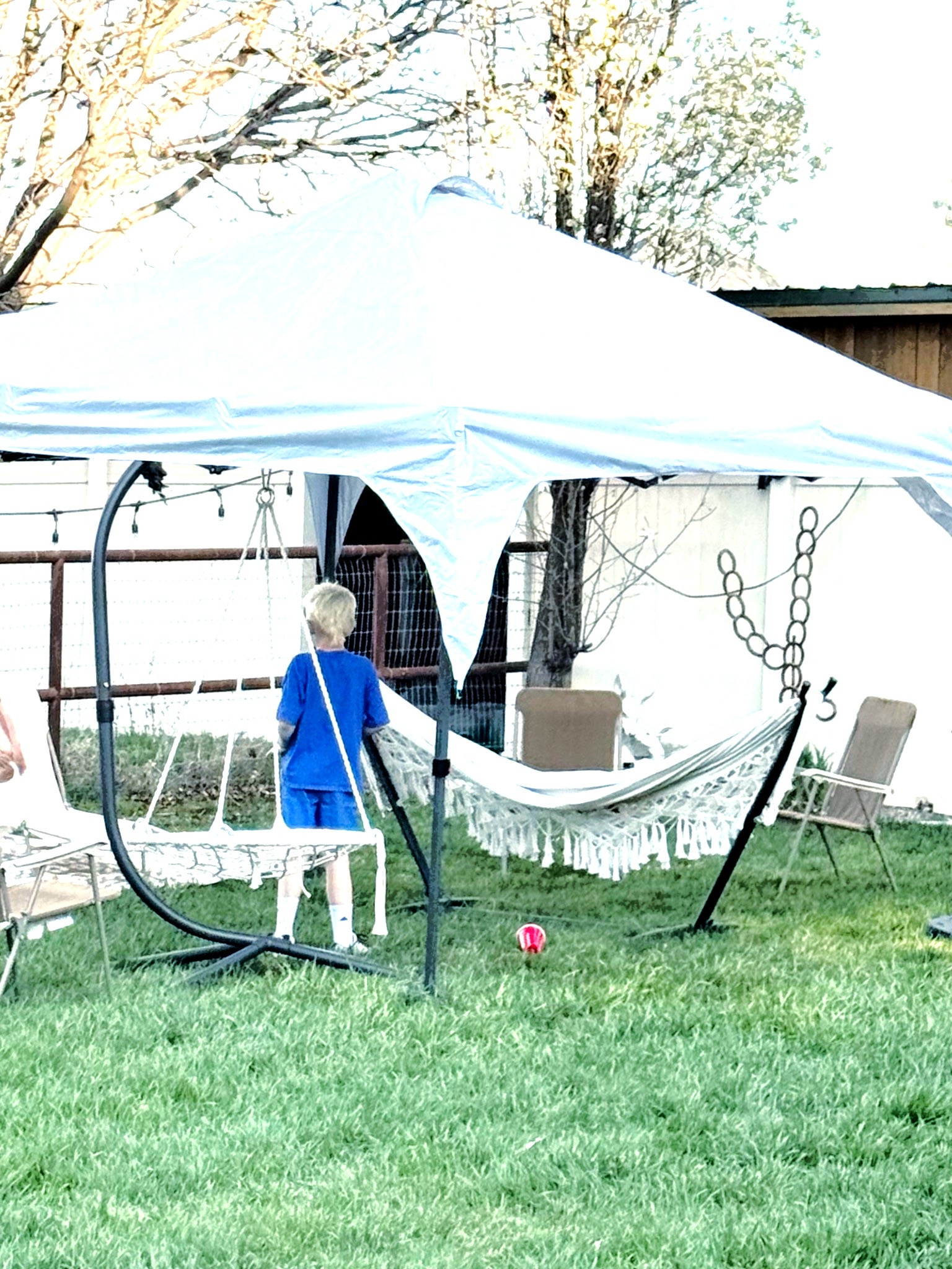 Pop-up shade + hammock + swing = the perfect little backyard escape. ☀️ 

#LTKHome #LTKSeasonal #LTKmomlife