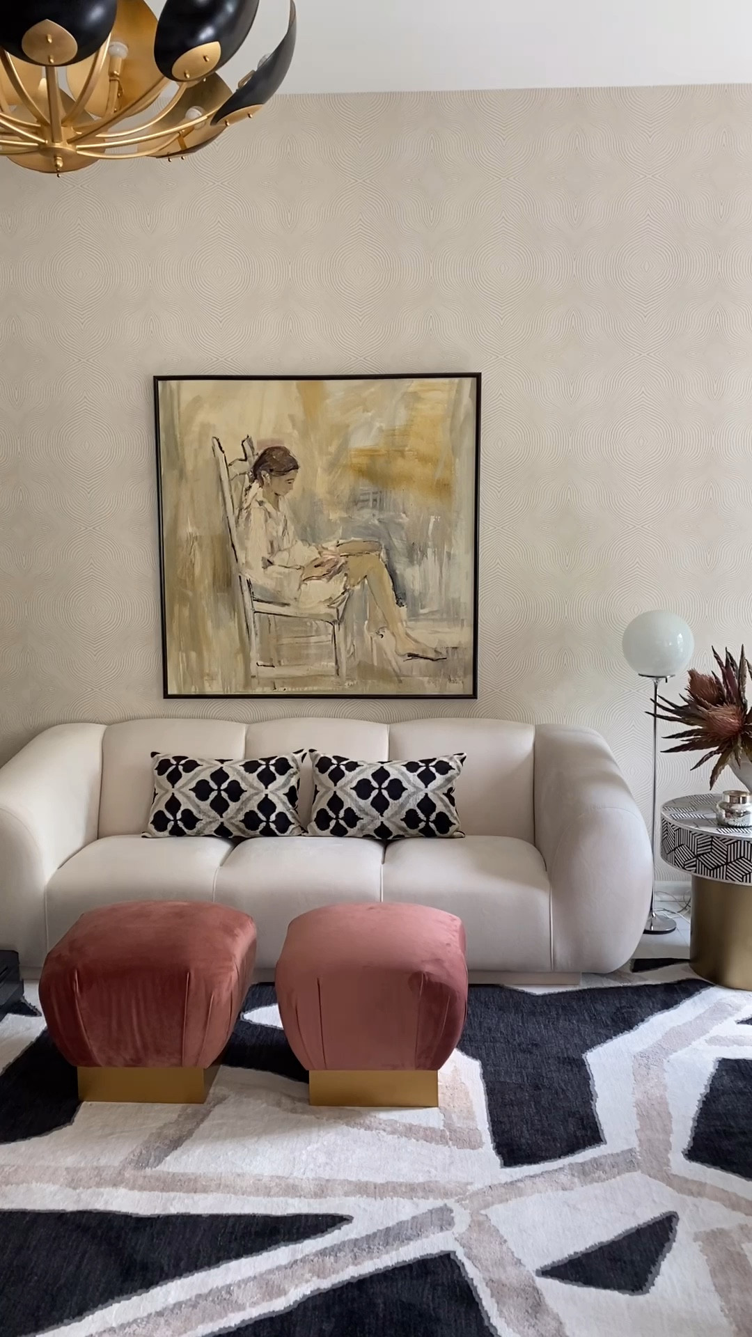 Eclectic modern interior design vibes with vintage decor accents in my home office that doubles as a living room. Some of my favorite features are the modern wall sconces, the black and white inlay accent table with brass base, the ikat silk pillows, the black and white graphic rug and the unique lighting ✨ what’s your favorite? Trying my best to source everything in this space. 

#LTKVideo #LTKhome #LTKover40