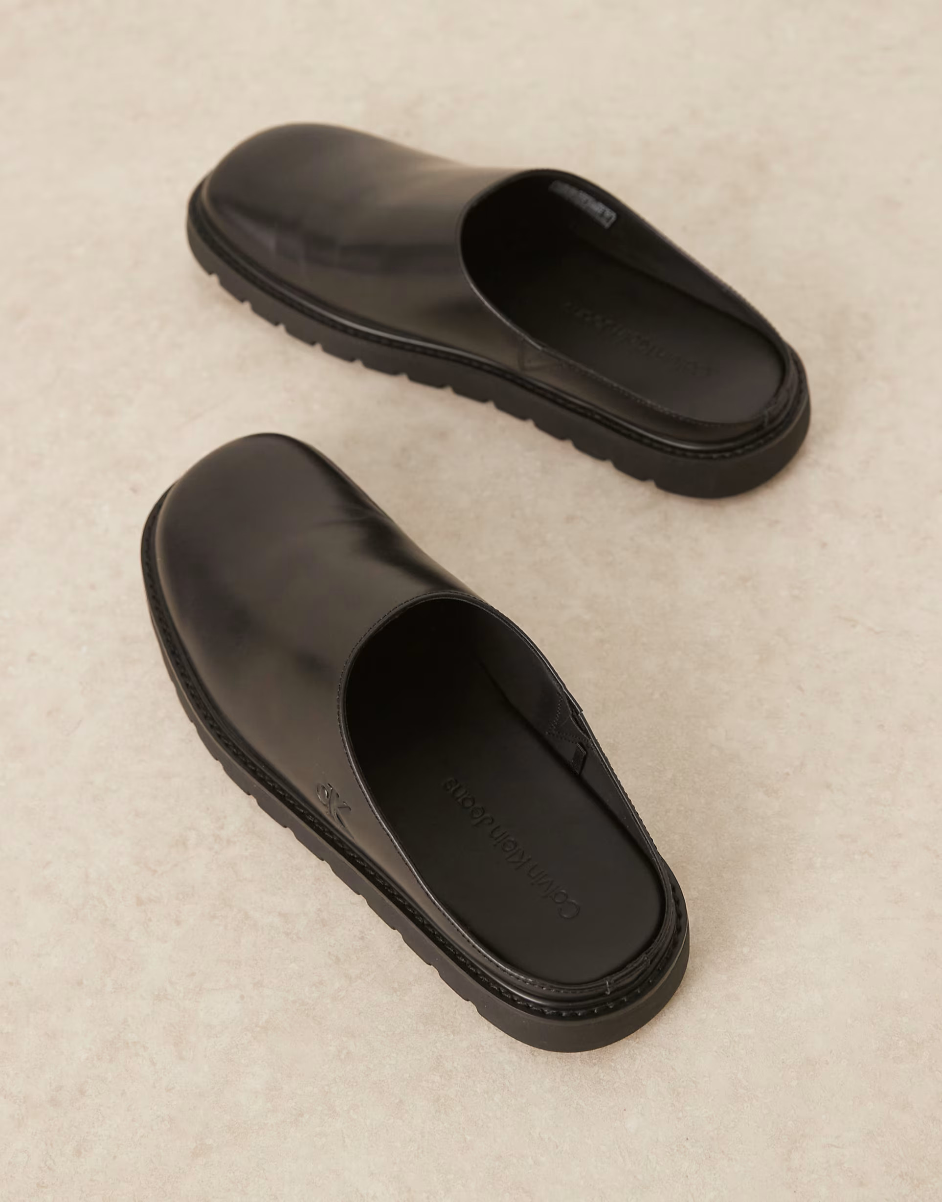 Calvin Klein Jeans molded slip on mules in black | ASOS (Global)