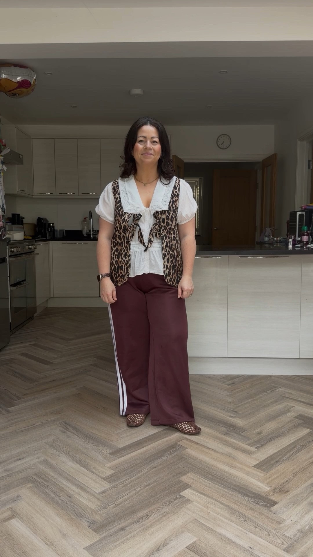 This is your sign to wear the bold, quirky outfit! Never in a million years would I have worn this before discovering my love for colour and patterns! Just the sporty track pants with the feminine blouse alone, it would never have entered my head!
So be brave, have a rummage in your wardrobe and try something different, you never know you might actually love it!
Trousers @adidasuk (stadium track pants, not firebirds IYKYK)
Gilet @damsonmadder 
Shoes @asos 
Blouse @primark 
Necklace @oliveandfrank 

#mumoutfit #midsizeoutfit #tomboyfemme #petiteoutfit 

if you’re new here, I’m Tara, a 40 year old mum of two tiny humans (18 months & 4), and a recovering beige girly 🙋‍♀️

I’m done with the pressure to snap back after babies. These days i’m rebuilding my confidence through colour, prints and patterns, and comfort-first outfits that actually work for real life.

Think dopamine dressing, midsize petite style, and mum outfits that aren’t just leggings 😅

If any of that sounds like you then why not drop me a follow 💛