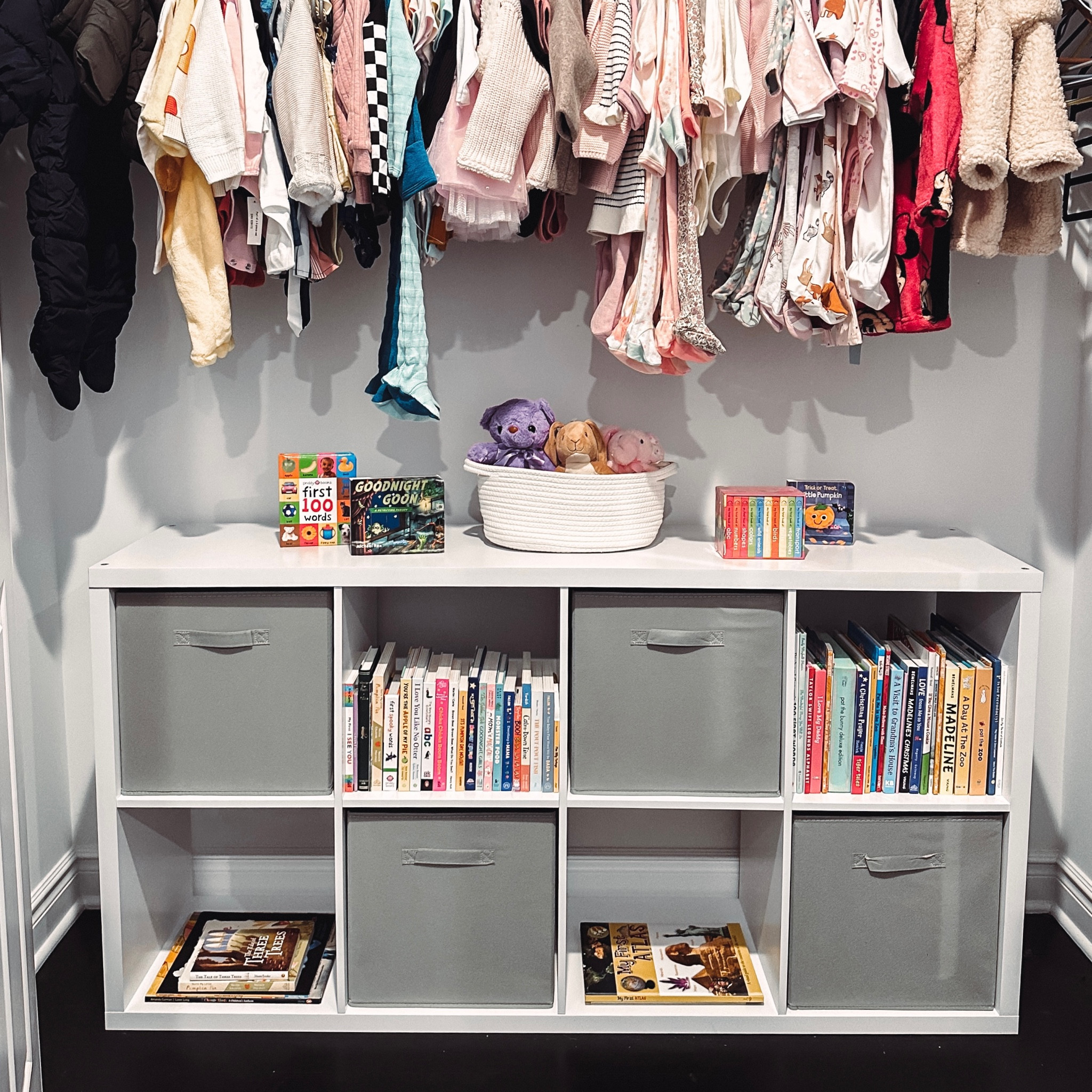Starting to put together the baby’s nursery and the first step was her closet. I hung up all of her clothes and also got this shelf/storage cube situation together. You could also fill all 8 shelves with the cubes but I liked alternating to have room for her books. 

#LTKbaby #LTKbump #LTKhome