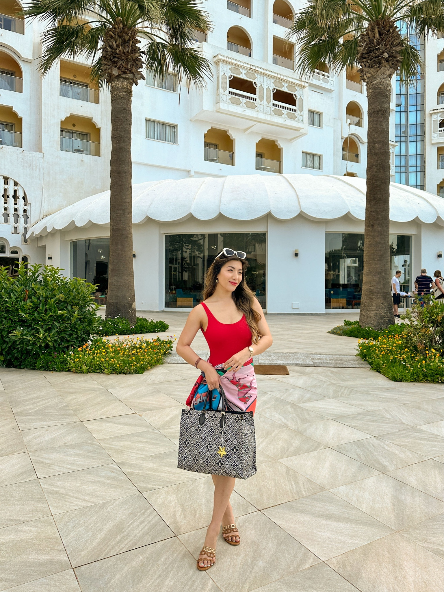 🔍 Red swimsuit, swimsuit, white sunglasses, cat eye sunglasses, retro style, LV, Louis Vuitton, Onthego tote, tote bag, holiday style, holiday style, beach outfit, beach style, sarong, Hermes scarf, Hermes sandals, vacation outfit 

#LTKswim #LTKSeasonal #LTKeurope