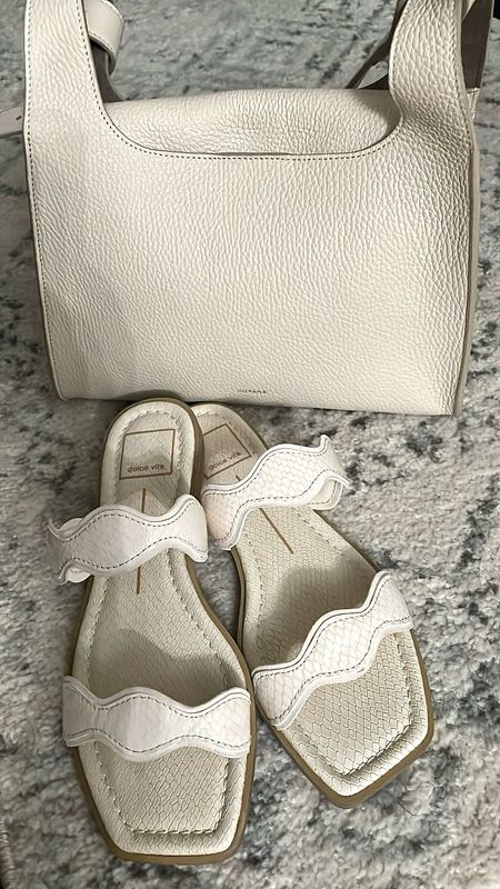 Shades of ecru. I love the texture of these ecru sandals. I went down half a size and they fit just like the nude color I got from DSW.

I used my Cuyana x ThredUP credits to get this Cuyana double loop bag. I wanted to cappucino color but it's currently out of stock.

Summer sandal
Summer bag

#LTKFindsUnder100 #LTKOver40 #LTKShoeCrush