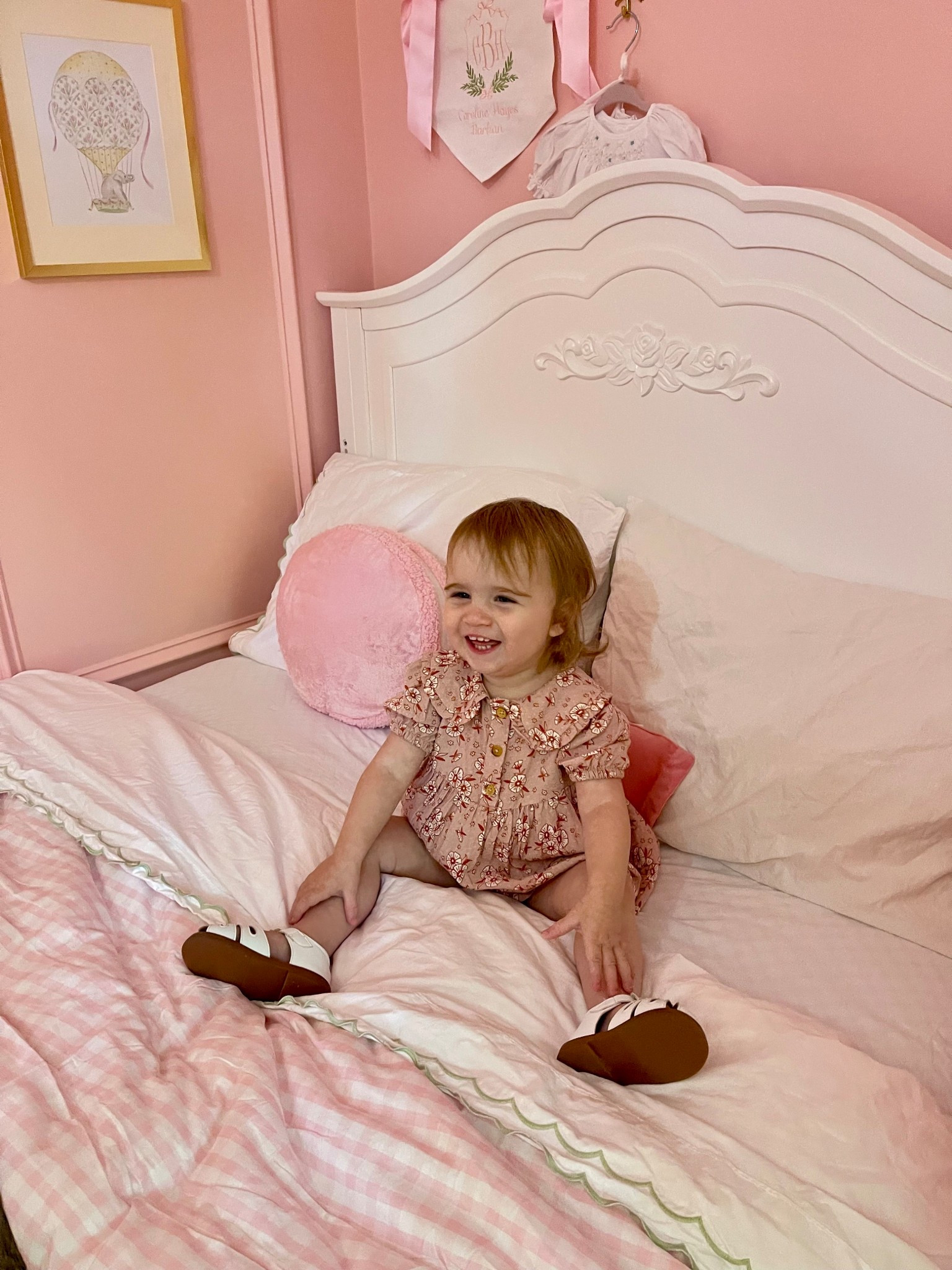 Caroline’s big girl bed reveal 💗
We swapped her crib for this dreamy DaVinci Fiona 4-in-1 Convertible Crib (used here as a full headboard) and layered on the sweetest bedding! The floral comforter is the Laura Ashley Morning Gloria Pink set 🌸, perfect for a timeless cottage-chic look. I mixed it with a pink gingham quilt for extra texture and kept her room soft and feminine with blush walls, white furniture, and gold accents.

Her dress is the Cat & Jack toddler short sleeve floral woven dress from Target — such a darling everyday piece for play or pictures, and only $18! Paired with her little white Mary Janes, it’s the perfect match to her room’s rosy color palette.

✨ Shop the look for a pink-lover’s dream bedroom + toddler style moment!

#ToddlerRoomDecor #LauraAshleyHome #PinkBedroomGoals #BigGirlRoom #CatAndJackStyle #ToddlerOutfitIdeas #PreppyRebelStyle #LTKkids #LTKhome #LTKfamily #ToddlerStyleInspo #GirlsRoomDecor #ToddlerBedroom


#LTKHome #LTKBaby #LTKKids