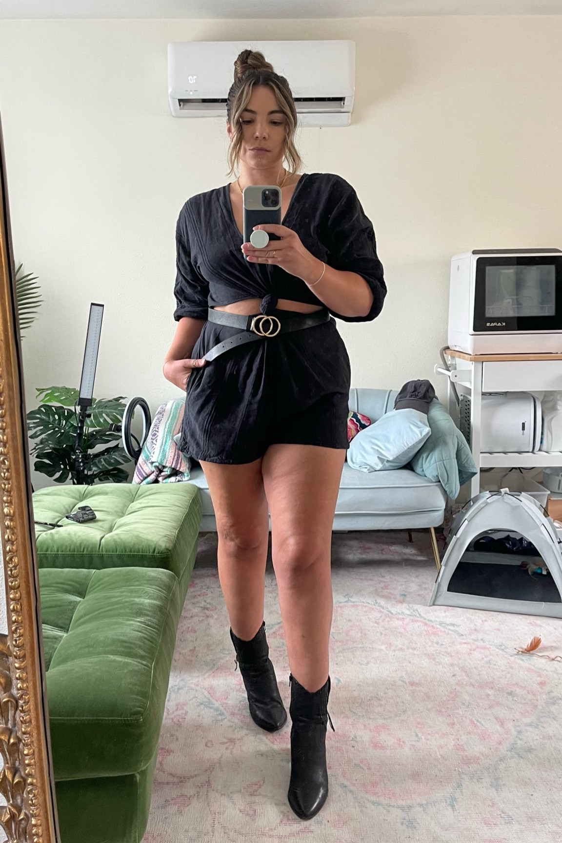 A midsize coastal cowgirl look with a free people knotty romper and western ankle boots. The romper size L fits like a 10/12 and is under $100. I added a belt to add a bit more style to the outfit 

#LTKunder100