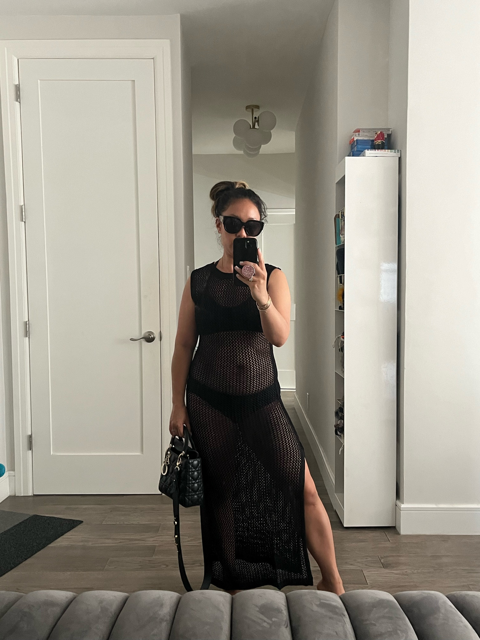 I’m trying a wider knit on this black crochet cover-up. I don’t understand why the cream ALWAYS look better than the black ones on me. I’m wearing a size small here. This one’s also a little long on me. I’m going to keep looking.

#LTKItBag #LTKTravel #LTKShoeCrush