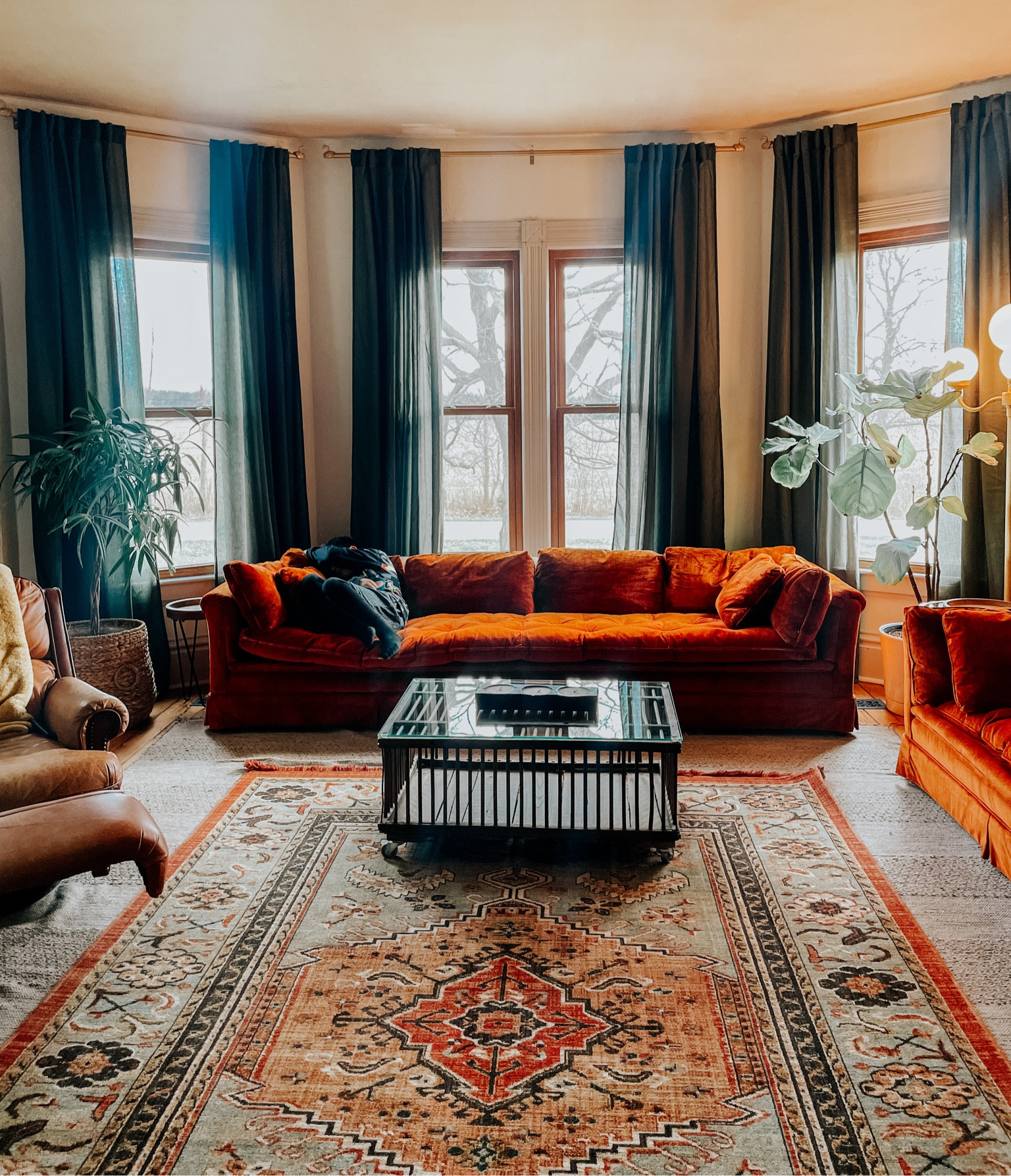 Living room decor.
#bohodecor #moodydecor #curtains #arearug

#LTKfindsunder50 #LTKhome #LTKstyletip