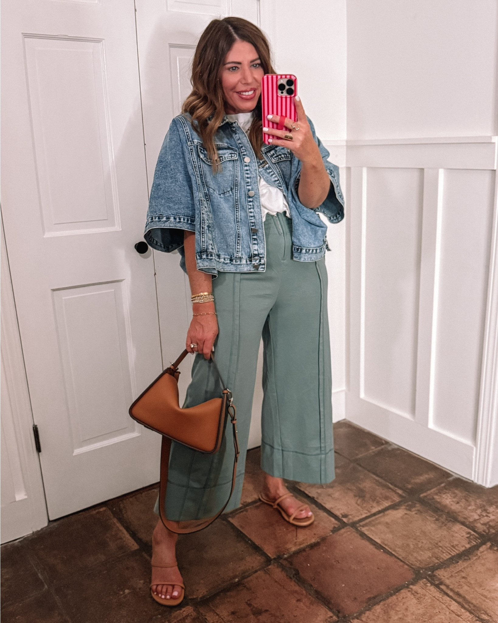 This Amazon cape does so much more than a regular denim jacket and can be styled so many ways. I sized up to a large because I wanted to make sure the arms draped the way it showed in the pictures. I’m wearing the light blue

High-rise wide leg elastic waist pants- They are a cotton poly blend. They’re so so comfy and I love all of the different seam details. They come in several colors and I have 4 of them. I’m wearing a medium. On sale $32.99

🩴One of my most worn sandals from Amazon on sale $18.89

spring outfits 2026, comfy casual

#LTKSaleAlert #LTKMidsize #LTKOver40