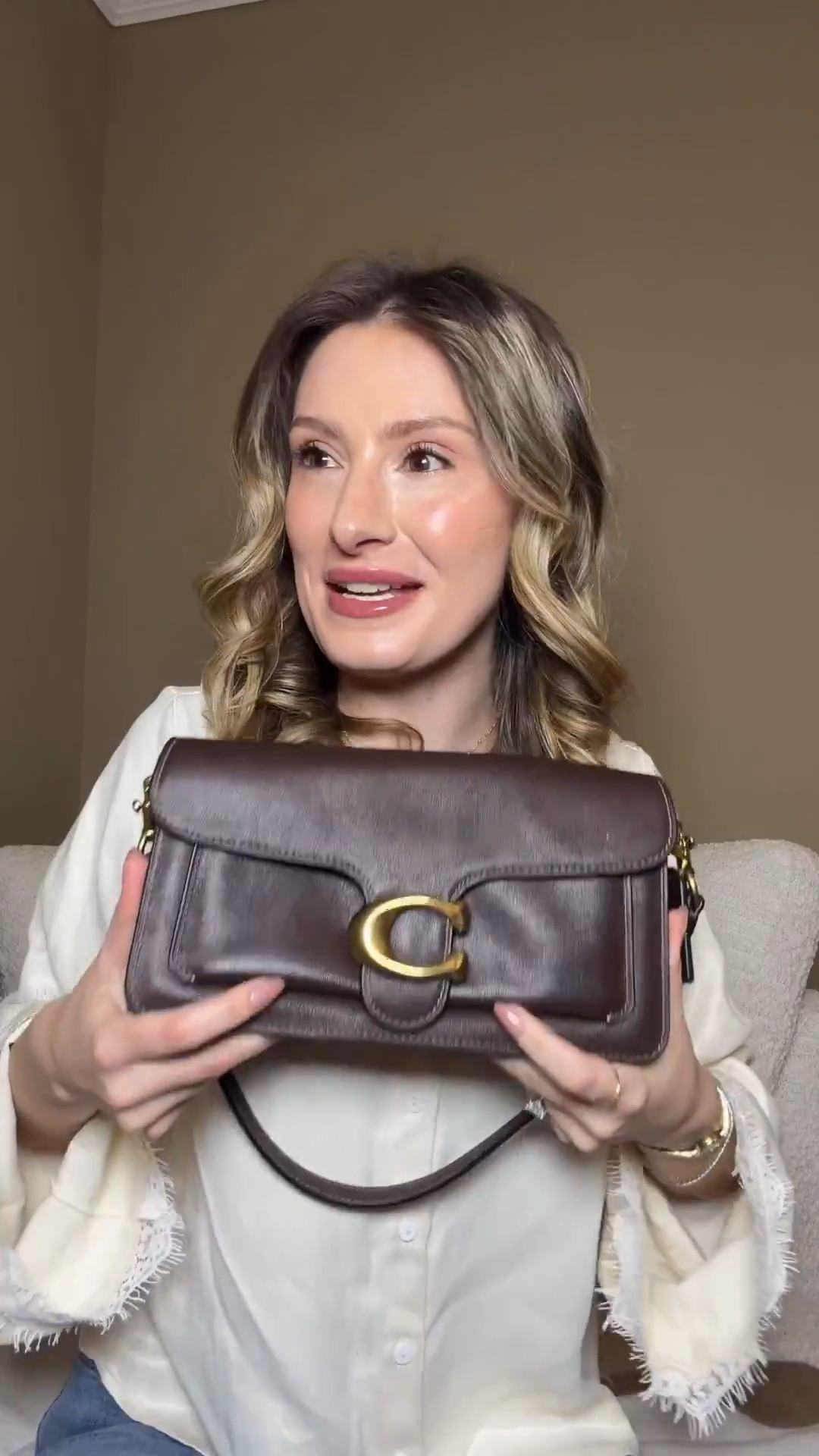 Unboxing the Coach Tabby shoulder bag 26 in the color maple 😍 Comment BAG & I’ll dm you the link 🤎

I love how relaxed and slouchy this tabby style is, so effortlessly chic and can go with any outfit! Maple with brass is my fave coach bag combo 😍 

It comes with a shoulder strap as well as a crossbody strap as well as multiple pockets inside so it is very functional. 

It is such a beautiful natural grain leather and amazing quality as coach purses usually are!



#LTKgrwm #LTKGiftGuide #LTKootd