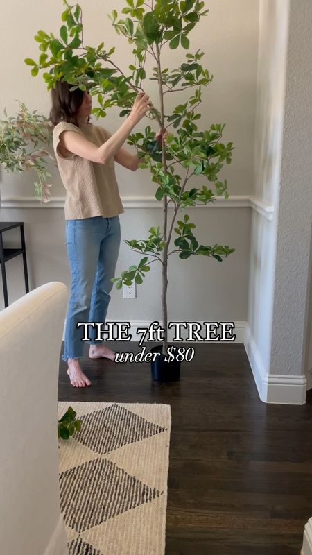 This affordable tree is almost exactly like the designer tree that’s very expensive! It’s 7ft tall and I know you’ll love it as much as I do! It’s meant to be minimal and simple if that’s the style you’re going for. 

Living room inspiration, home decor, our everyday home, console table, arch mirror, faux floral stems, Area rug, console table, wall art, swivel chair, side table, coffee table, coffee table decor, bedroom, dining room, kitchen,neutral decor, budget friendly, affordable home decor, home office, tv stand, sectional sofa, dining table, affordable home decor, floor mirror, budget friendly home decor, dresser, king bedding, oureverydayhome 

#LTKVideo #LTKHome #LTKFindsUnder100