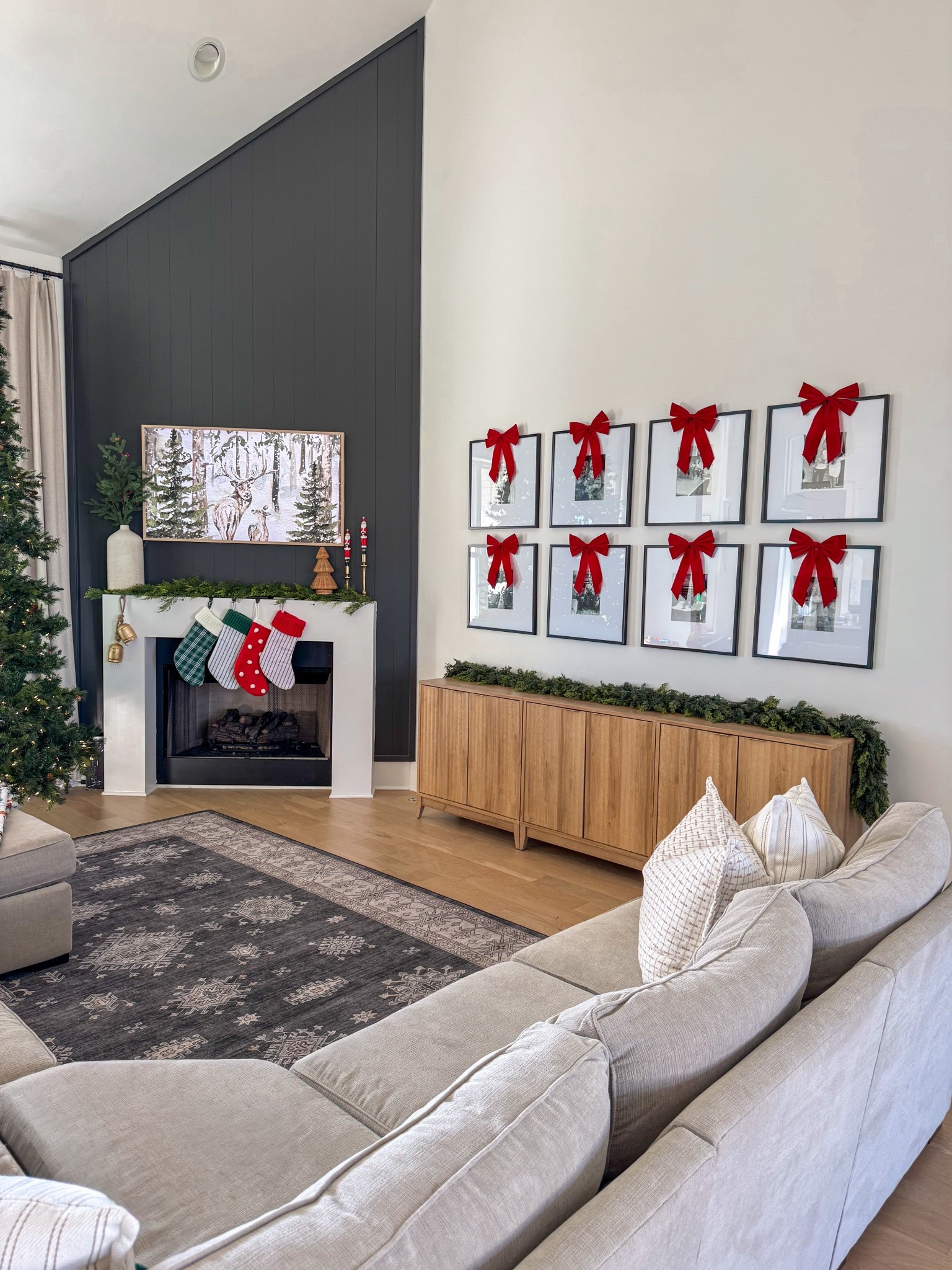Christmas Decor | Real Touch Cedar Christmas Garland | Christmas
Bows On Photo Wall Collage | Red & Green Striped Classic Stockings | Christmas Frame TV Art | Living Room Cabinets Sideboard Credenza Holiday Decor | Santa Taper Candlesticks | Rattan Christmas Tree

#LTKHoliday #LTKHome