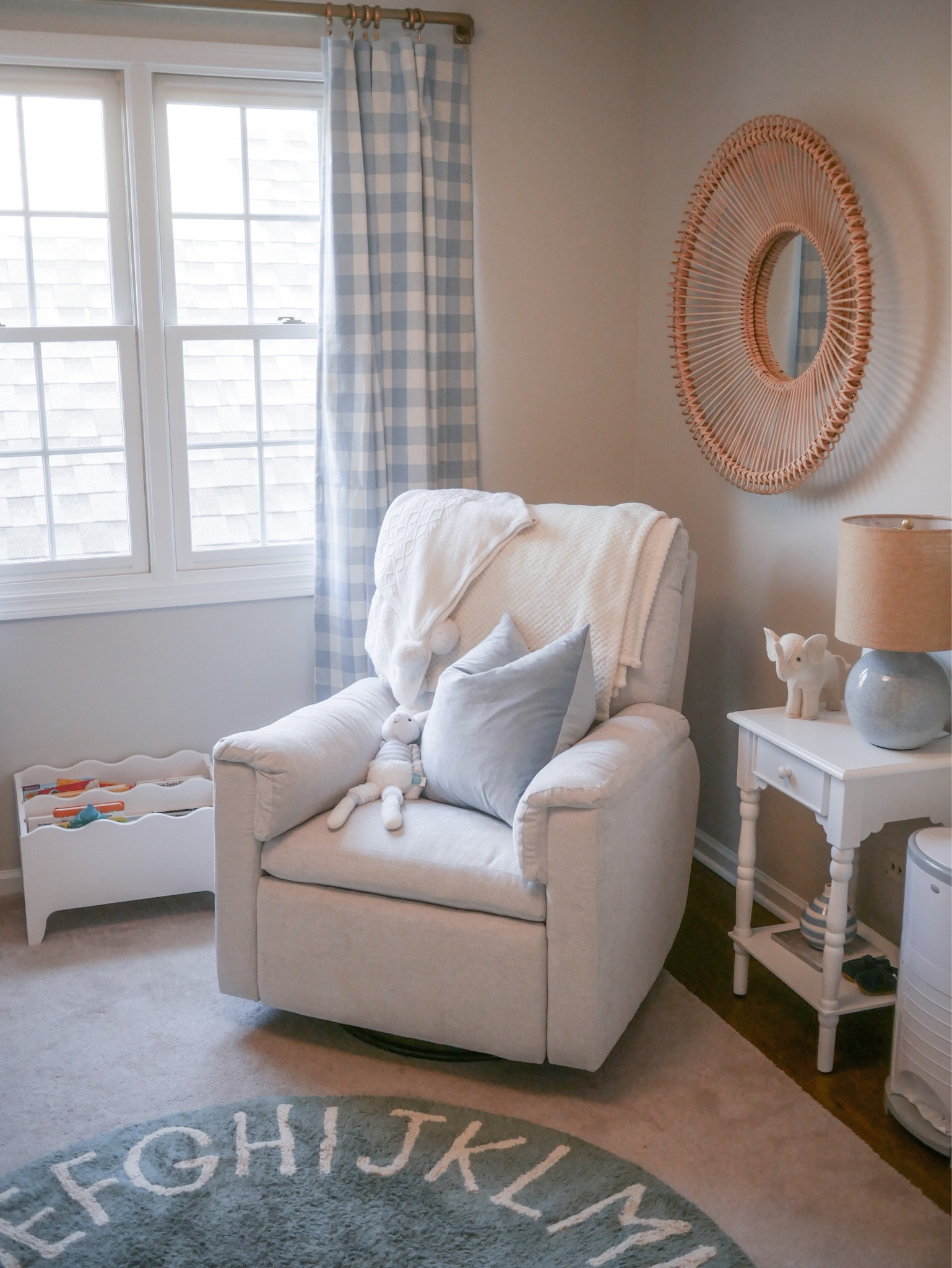 Baby boy’s nursery room with blue, gingham, and rattan 

#LTKhome #LTKkids #LTKbaby