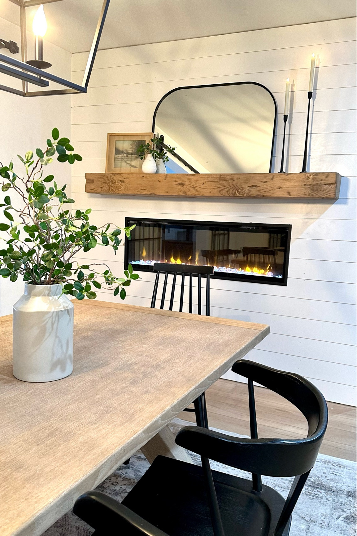 My newly renovated DIY Dining Room complete with a linear electric fireplace, rustic mantel, arched mirror and Flameless candles. Simply styled, but has that comfy, cozy vibe. It’s my favorite room in my house so far! 

🏷️ fireplace style, mantel style, rustic dining room, modern farmhouse dining room, modern rustic fireplace, pottery barn chairs, dining room table, black dining room chairs, arched mirror

#LTKFind #LTKhome #LTKunder50