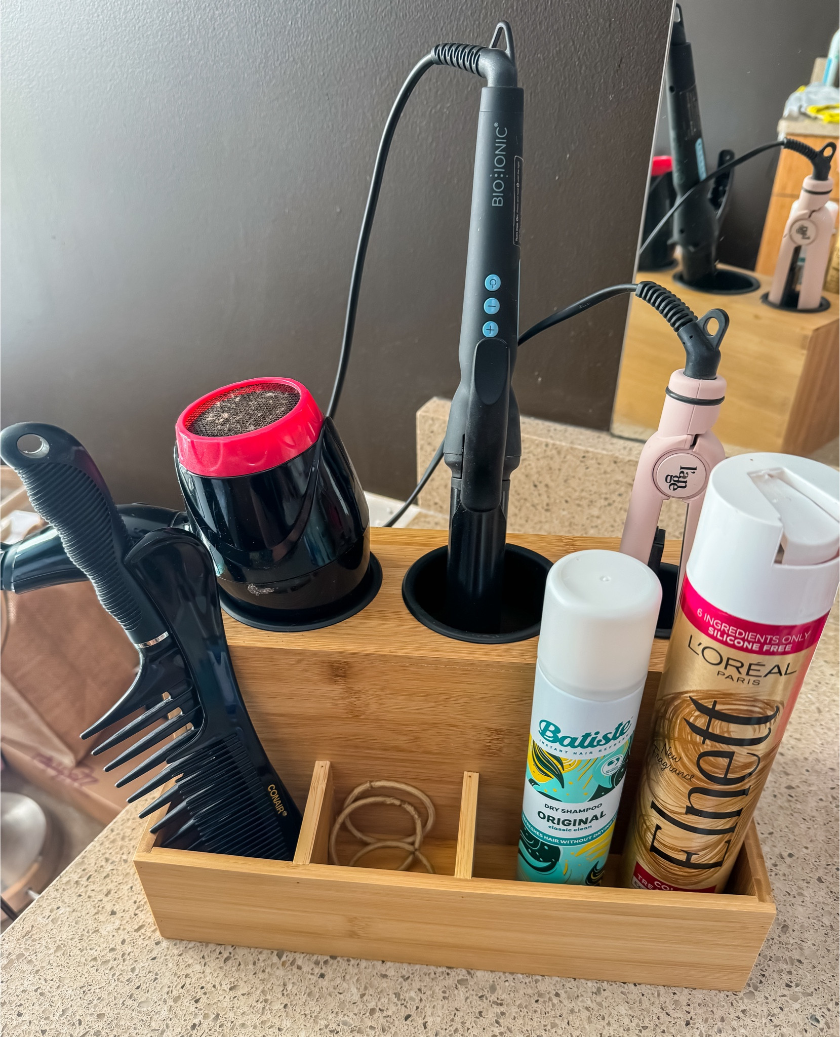 Real Life: My bathroom counter was a hot mess! It needed this hair tools organizer desperately, and I’m so glad I found it! A place for everything and just $13.88!