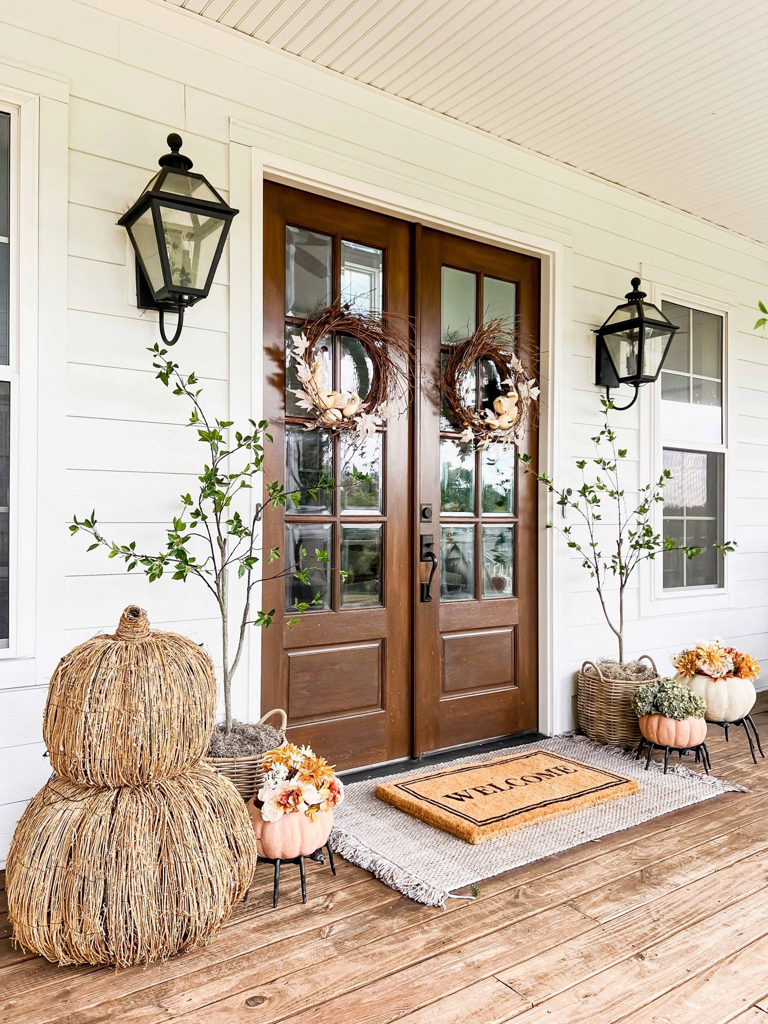 Last years fall porch/front doors! Love the neutral green trees with subtle hints of orange and these pumpkins are the best!

#LTKHalloween #LTKSeasonal #LTKHome